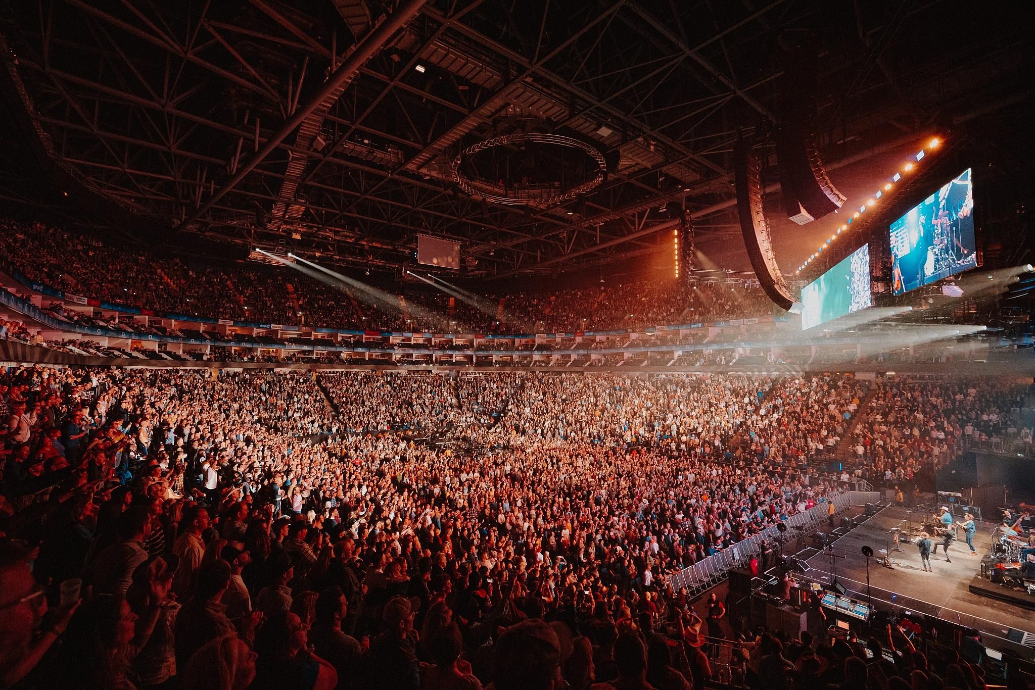 The O2 London — iconic arena interior with stage, crowd and bright lights, corporate hospitality venue in Greenwich, London