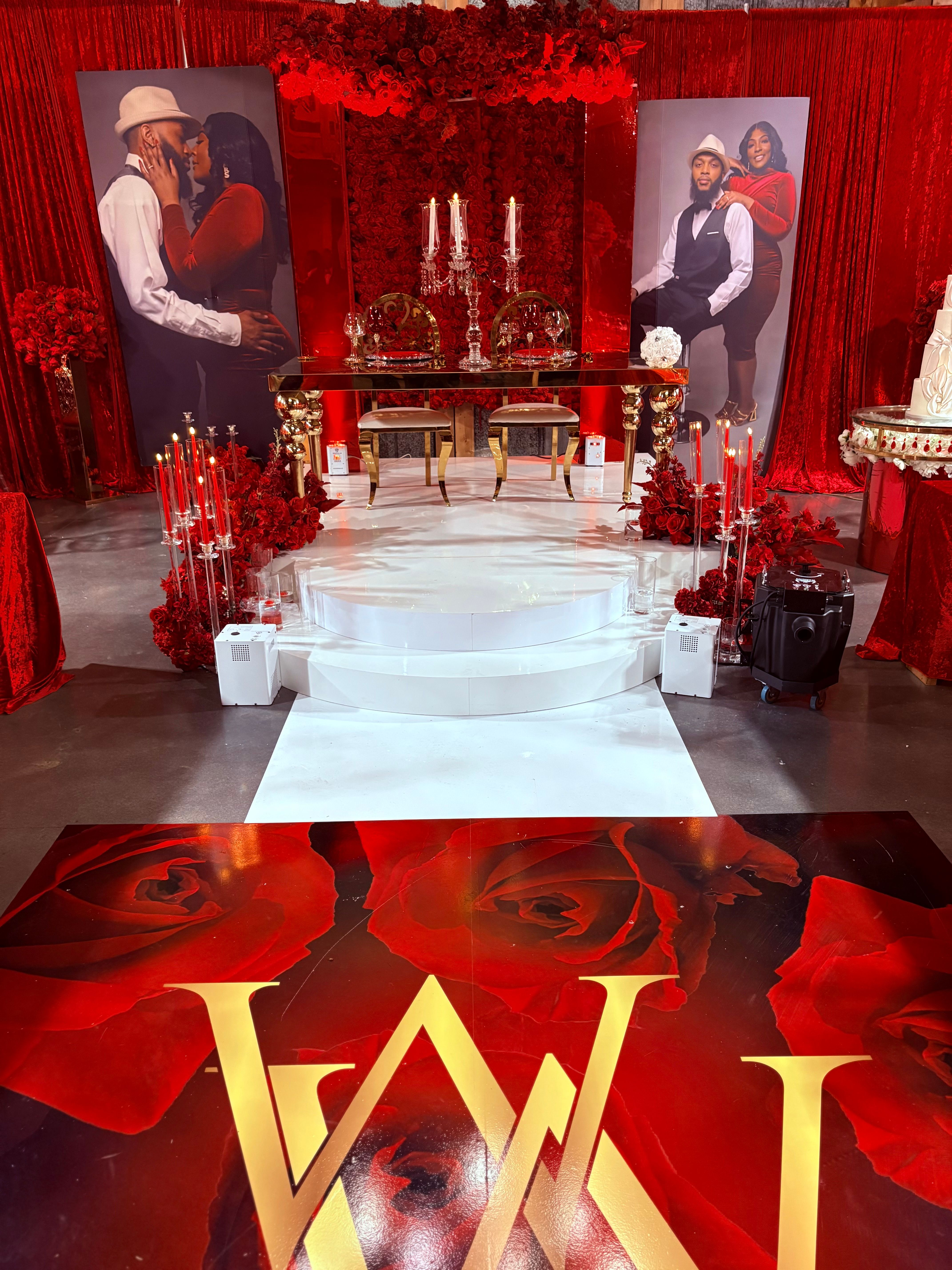Luxury red wedding ceremony with floral wall backdrop