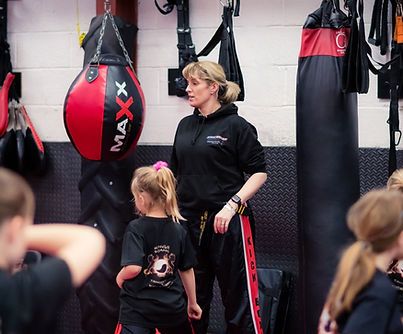 Claire King — Owner and Head Coach