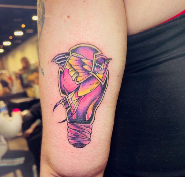 Color tattoo by Justin - bird inside a broken light bulb