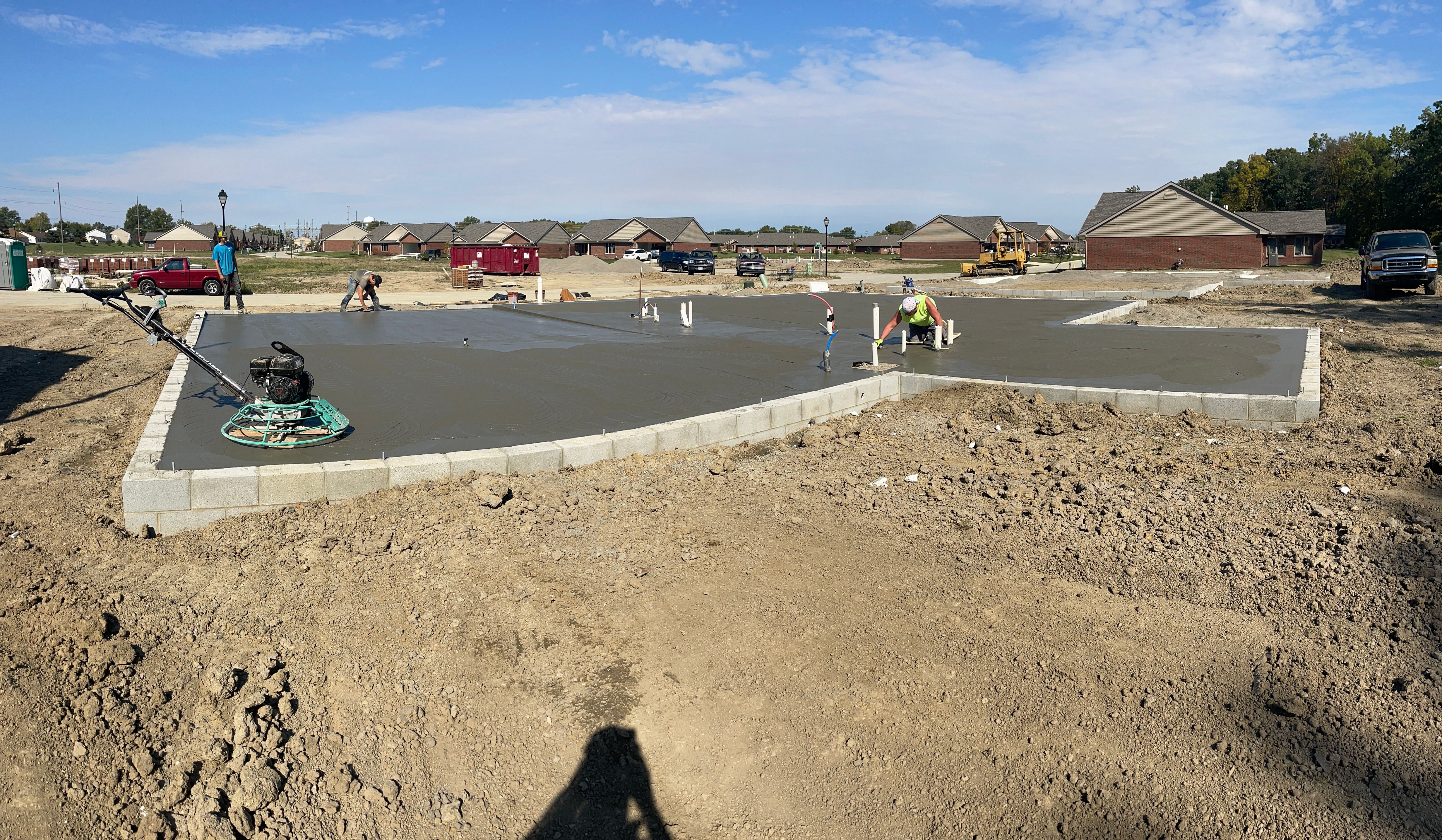 BURG CONCRETE crew finishing a large concrete slab pour for a foundation in Central Ohio