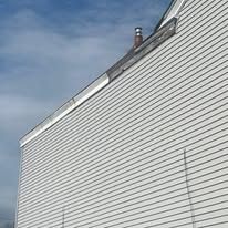 Professional gutter and downspout installation on residential home Pittsburgh PA