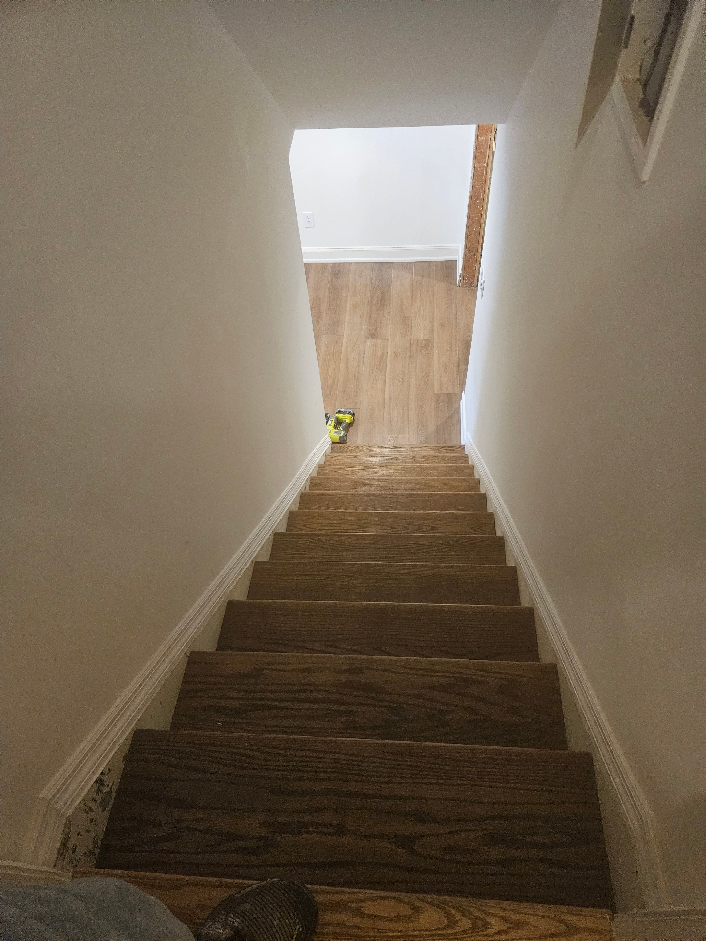 New staircase with hardwood flooring installation