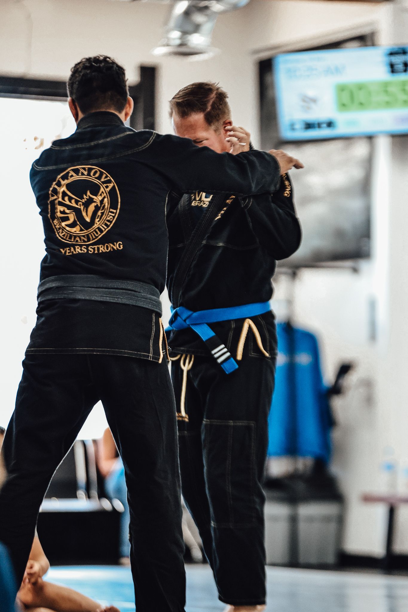 Professor Beto and Coach Mike demonstrating Osoto Gari takedown for students