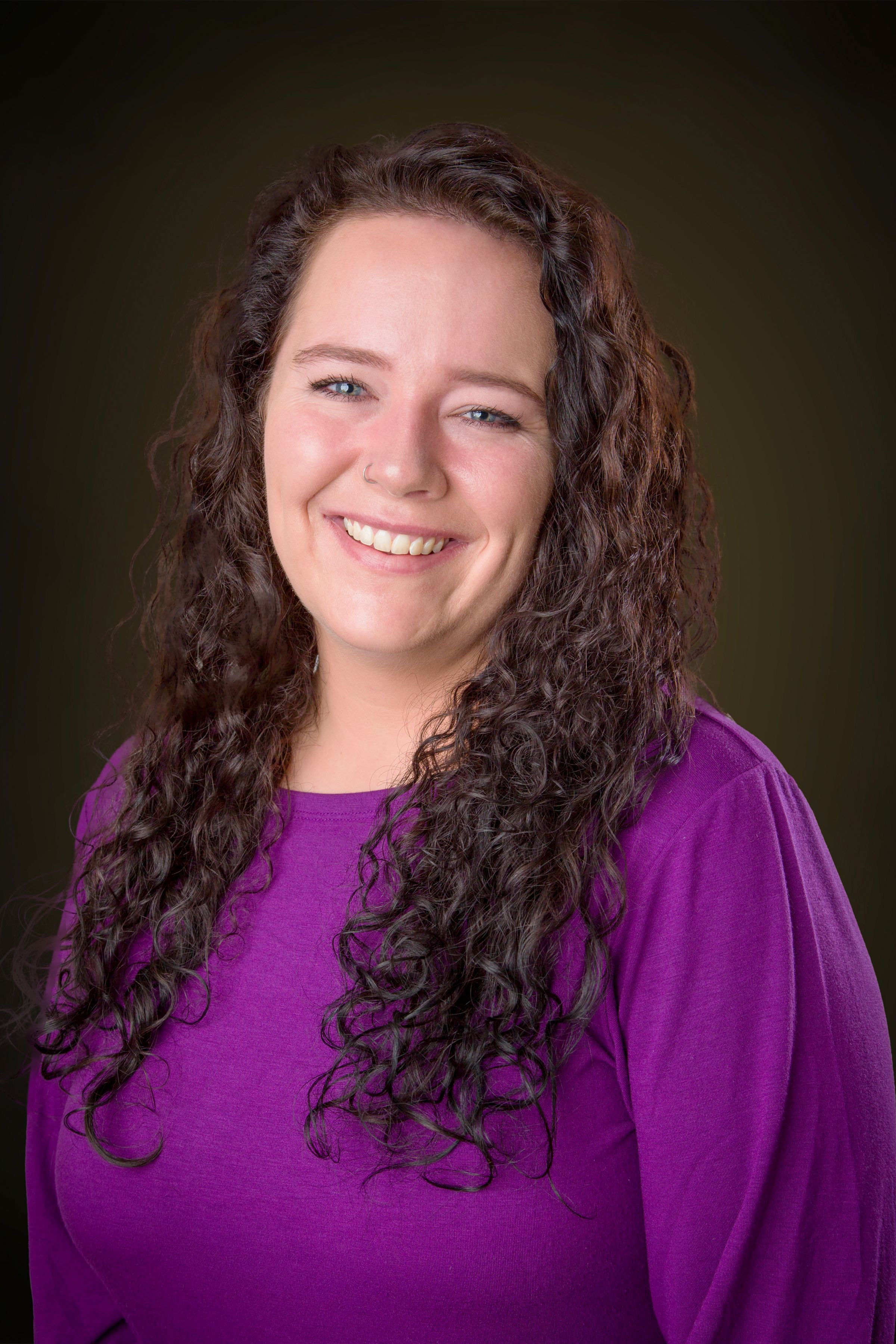 Professional headshot - woman with blue eyes