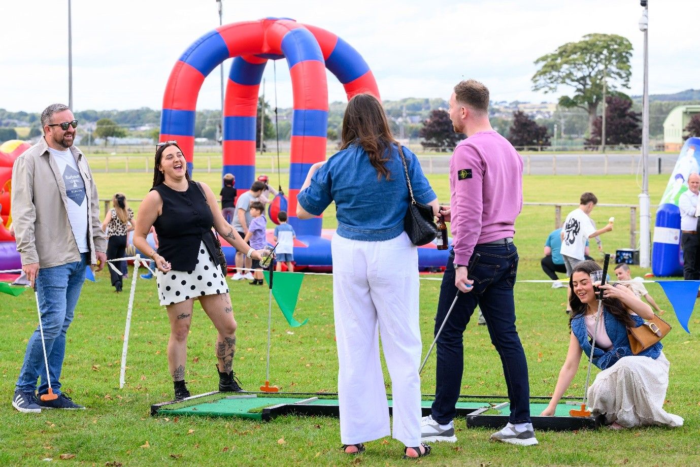 Corporate fun day employee engagement — inflatables, carnival games and live entertainment UK