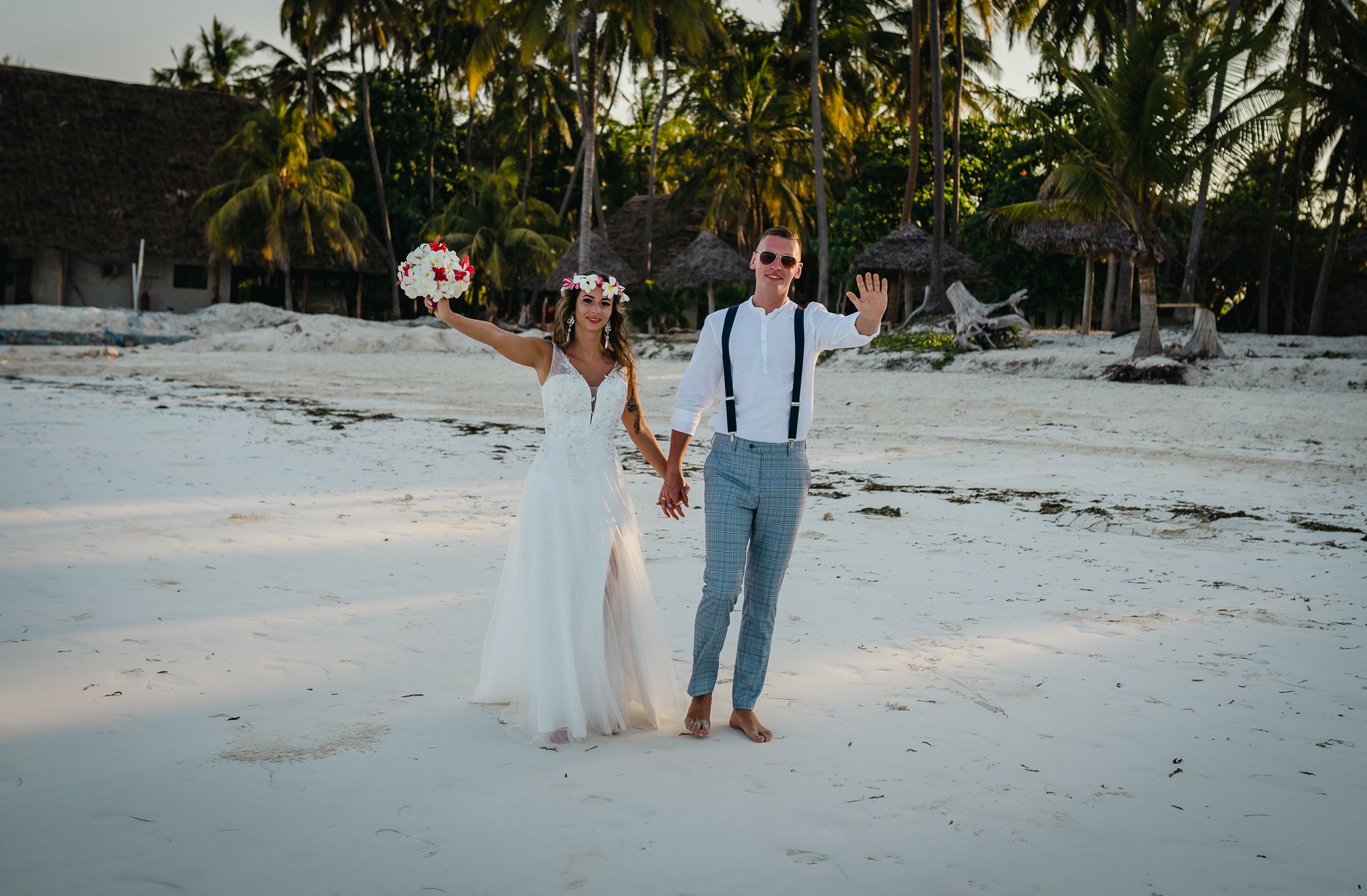 Couple celebrating on Zanzibar beach