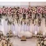 Floral stage backdrop with soft colours