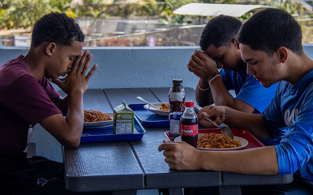 Empower Baseball players sharing a meal together after practice