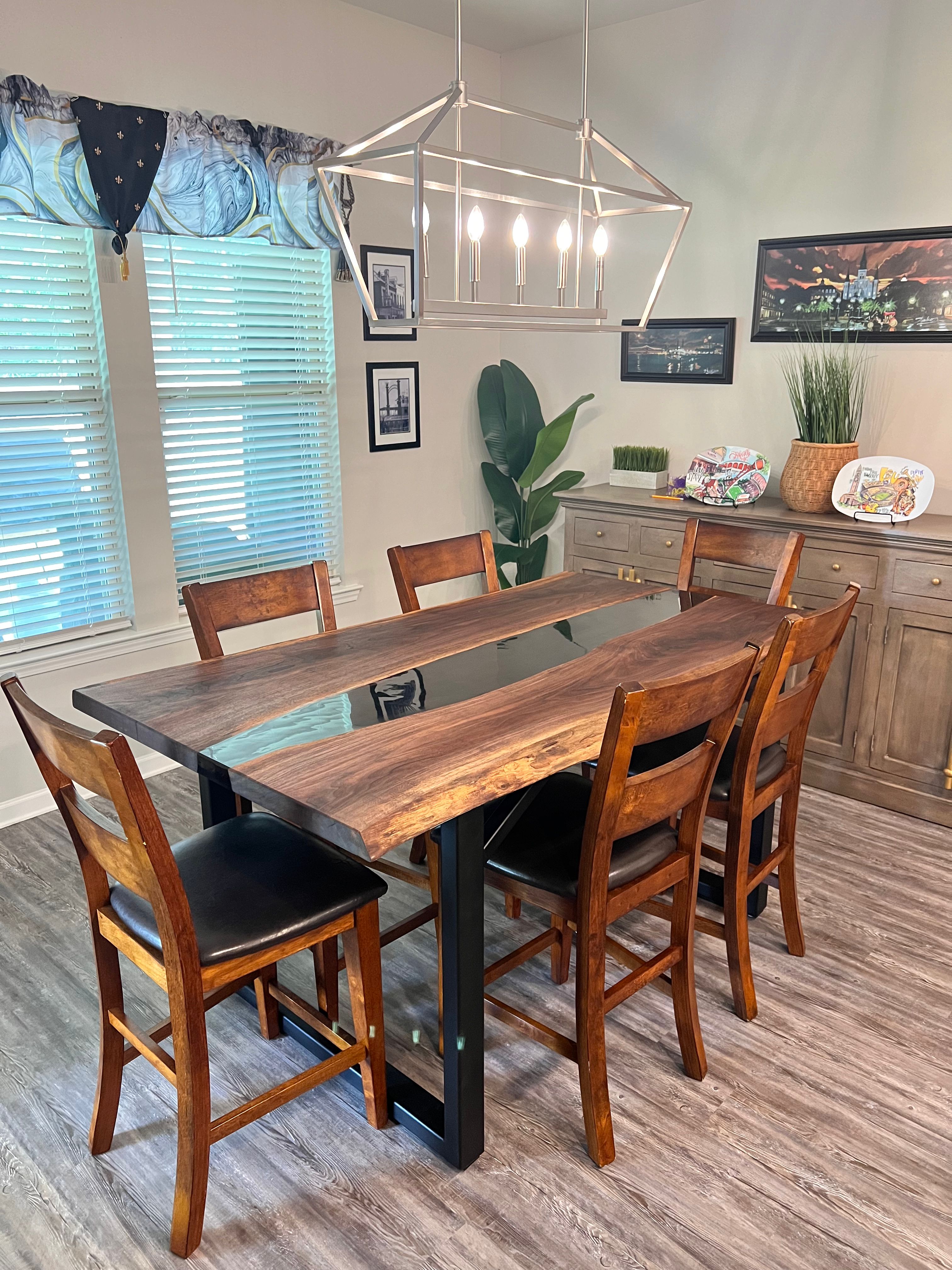 Custom epoxy river dining table with natural wood and clear resin by Bark and Brushes Abita Springs LA