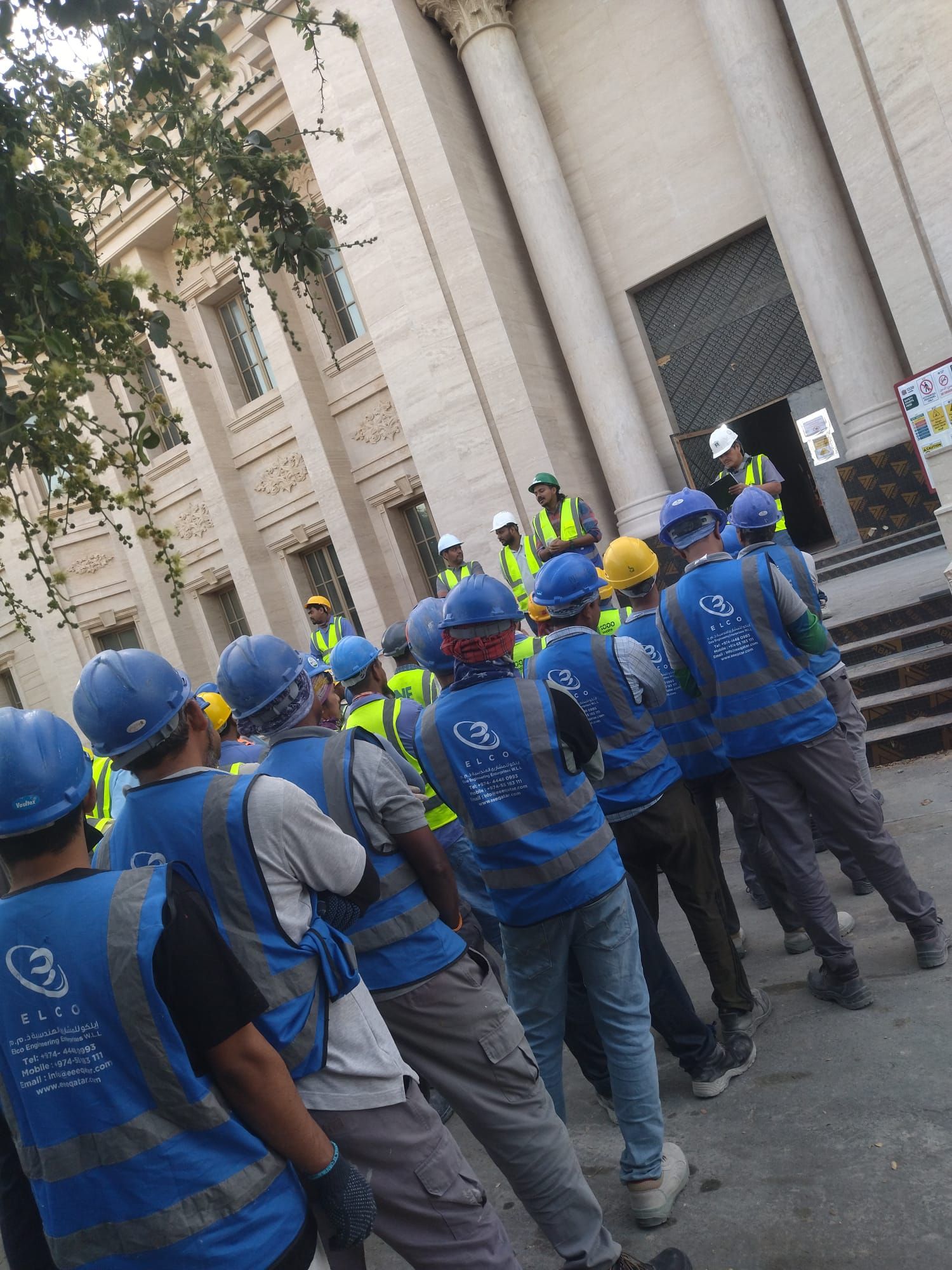ELCO Engineering team in branded uniforms and safety gear at project site
