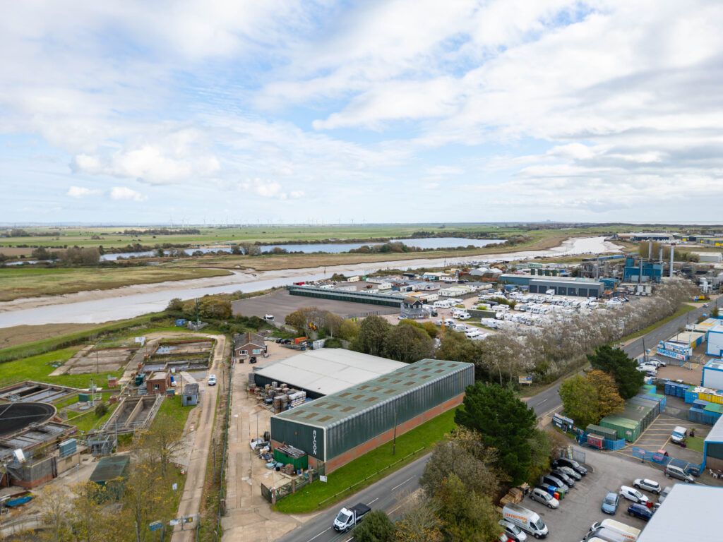 Aerial drone view of commercial warehouse property in East Sussex