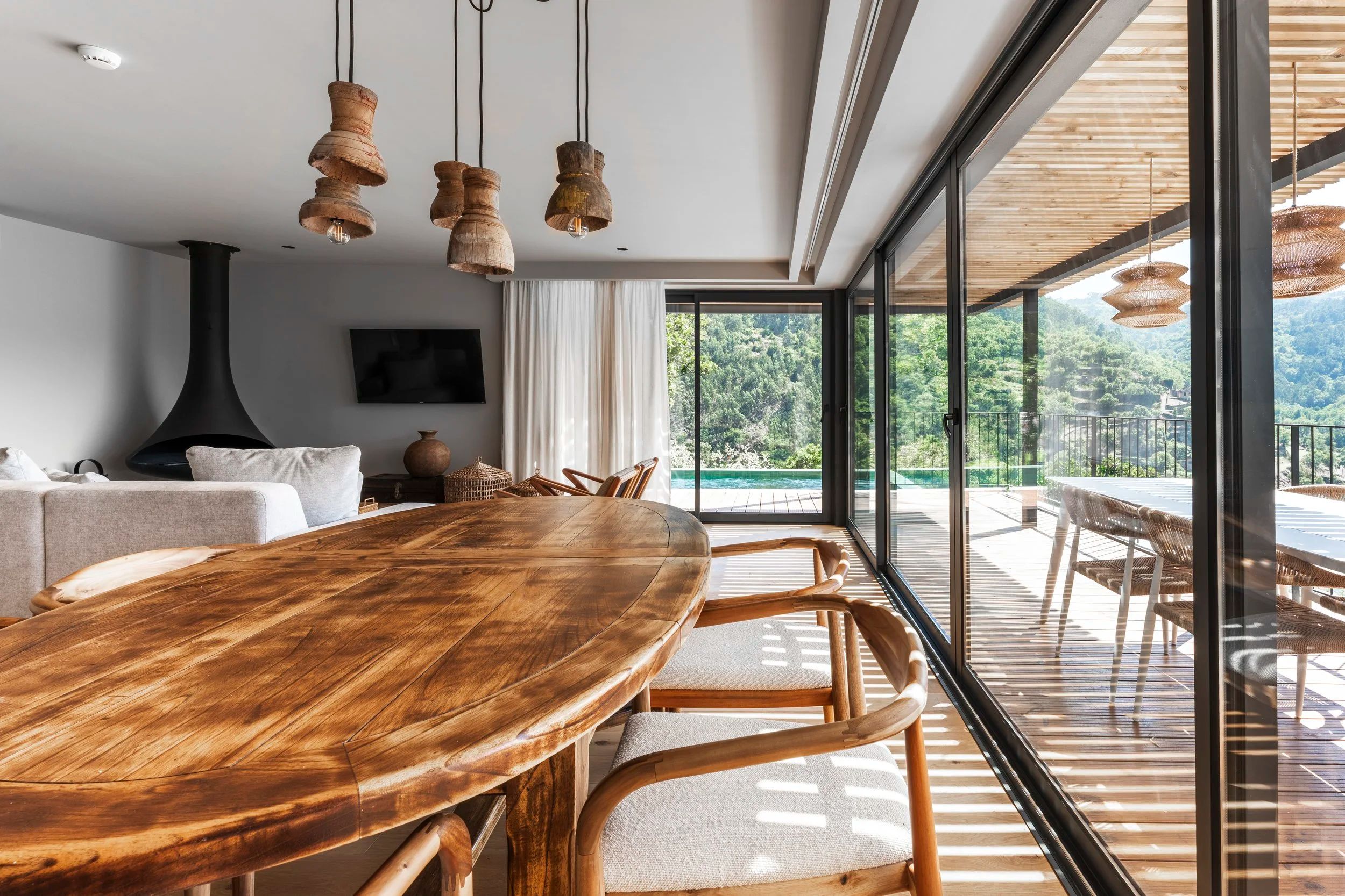 Open-plan dining and living space in a boutique property — architectural and hotel photography in Porto by Pedro Tavares