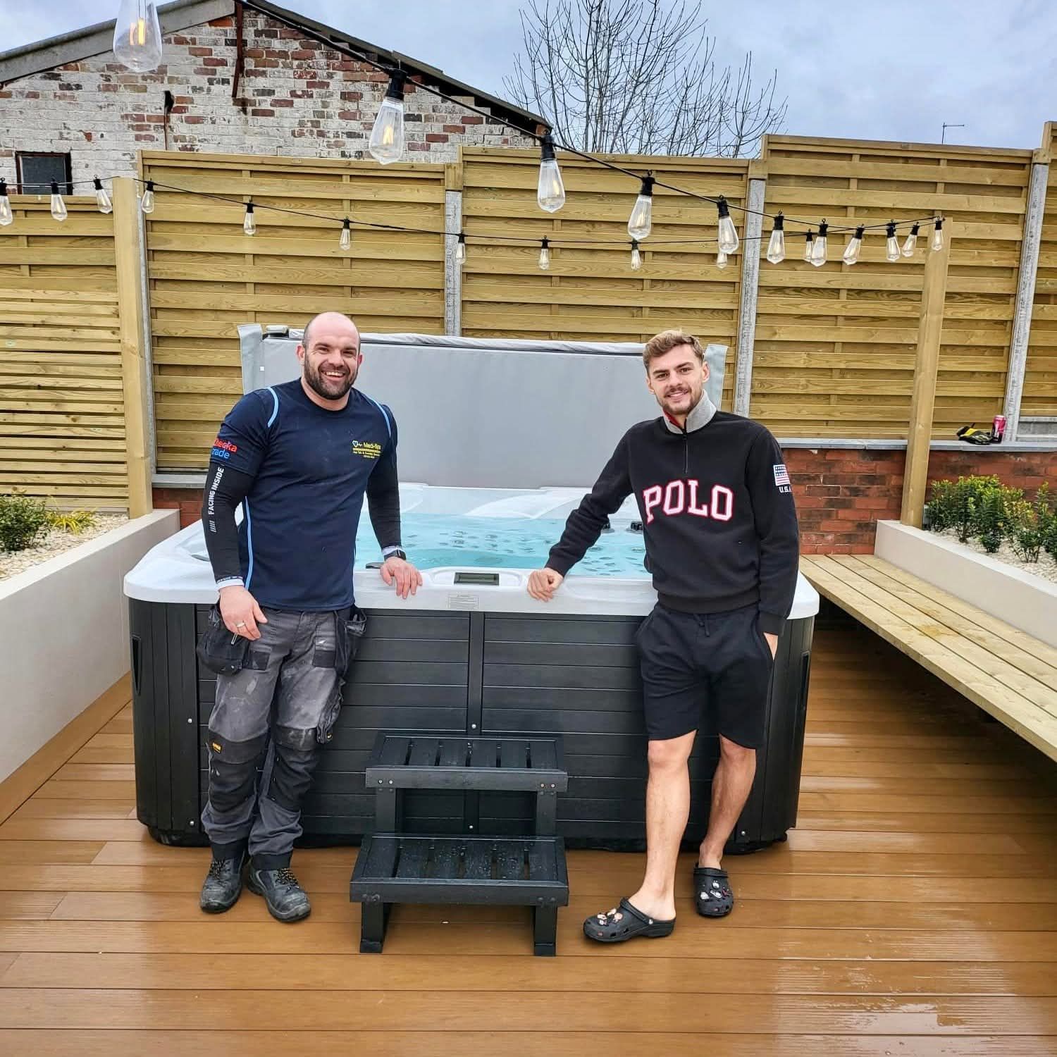 Medi-Spa team with completed hot tub installation