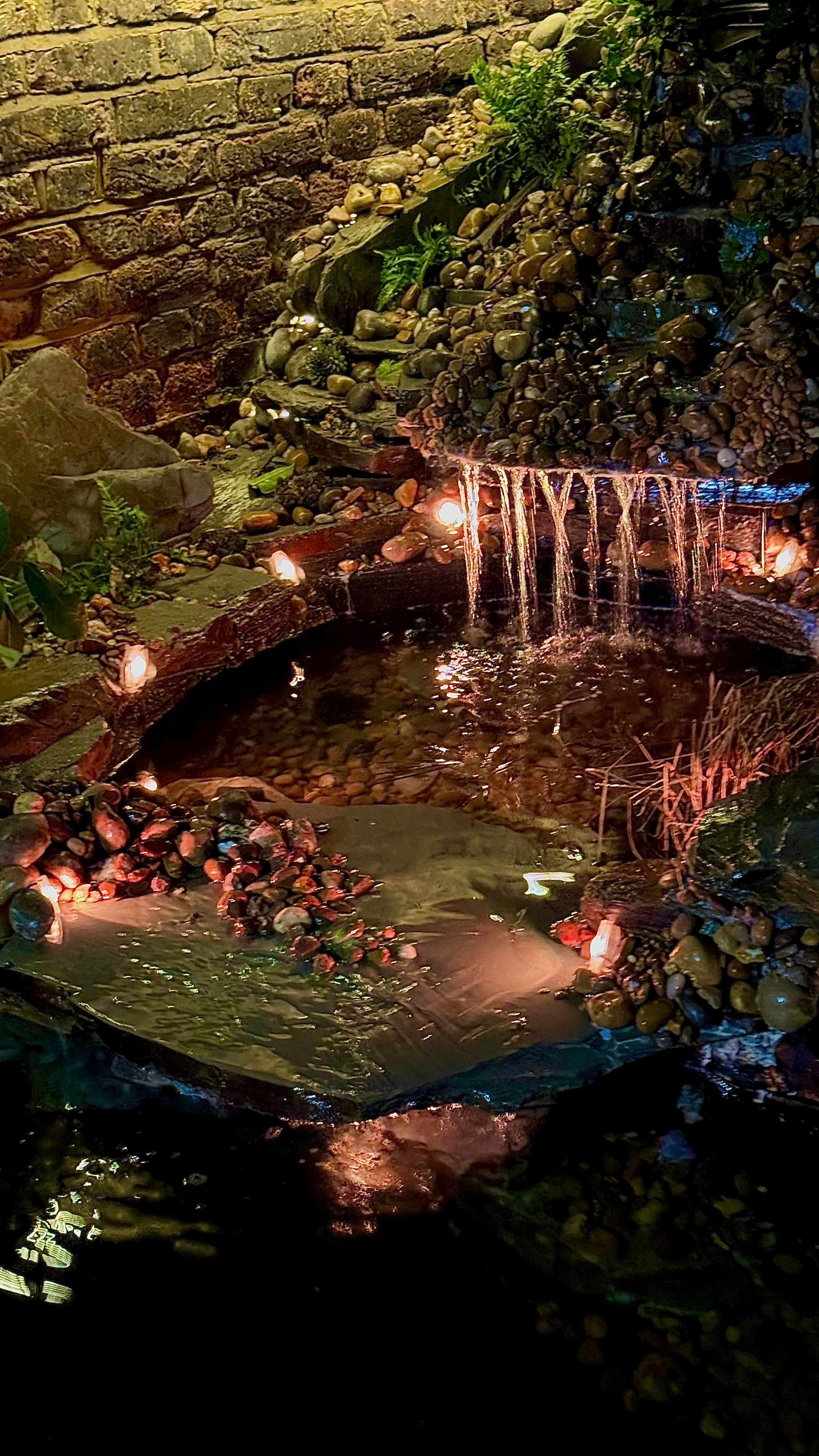 Water feature with lighting in Dulwich garden — Wicked Gardens LTD