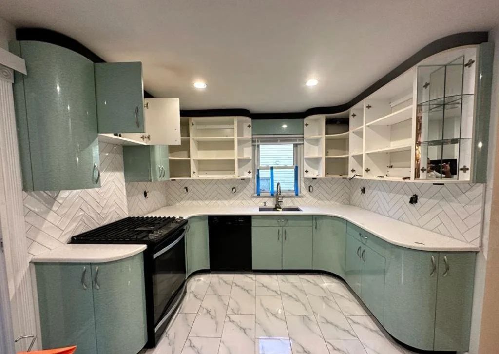 Kitchen with herringbone backsplash
