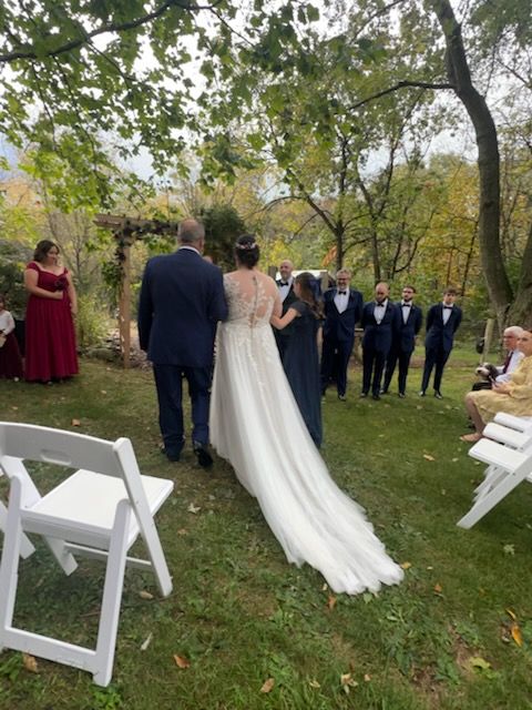 Bride walking down the aisle with bridal party