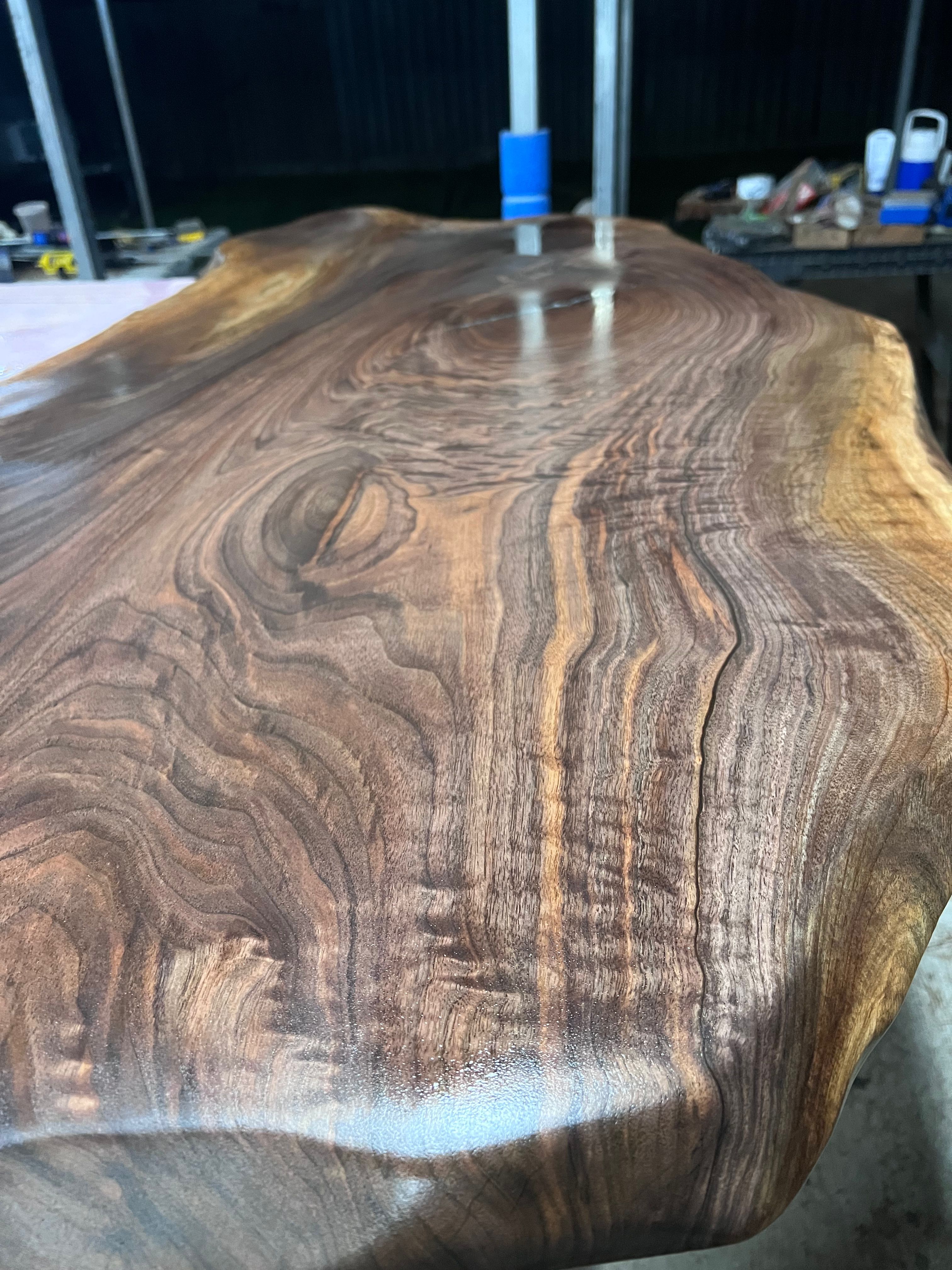 Polished live edge wood surface with natural grain pattern Abita Springs workshop