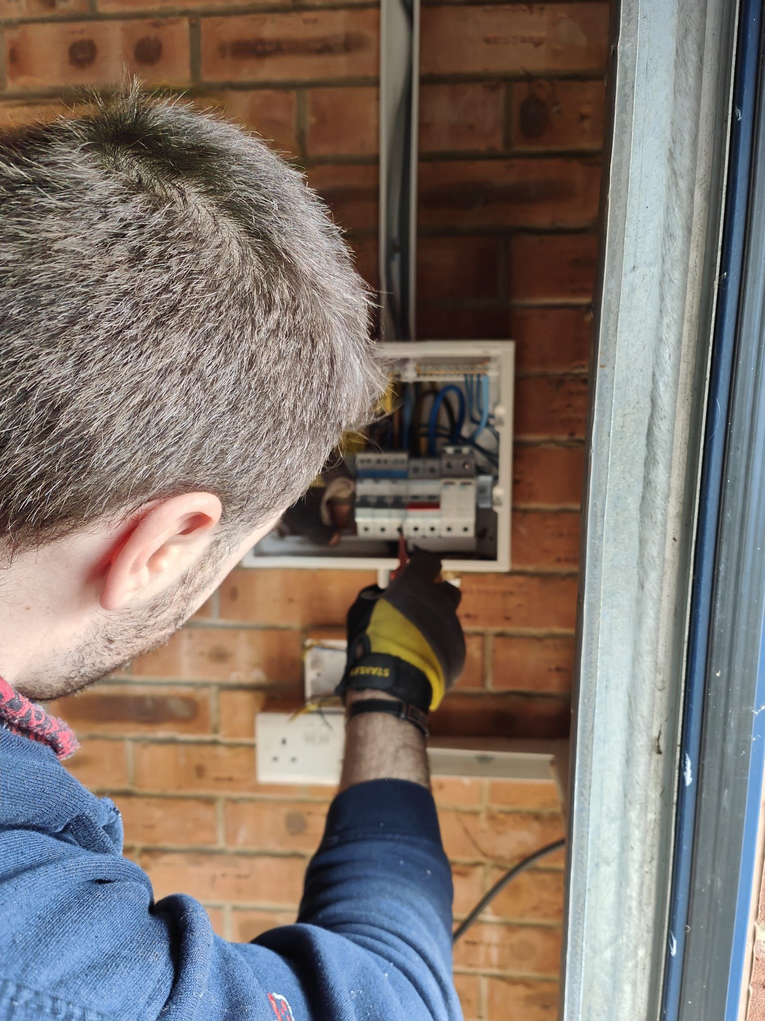 NICEIC electrician Cardiff working on consumer unit upgrade