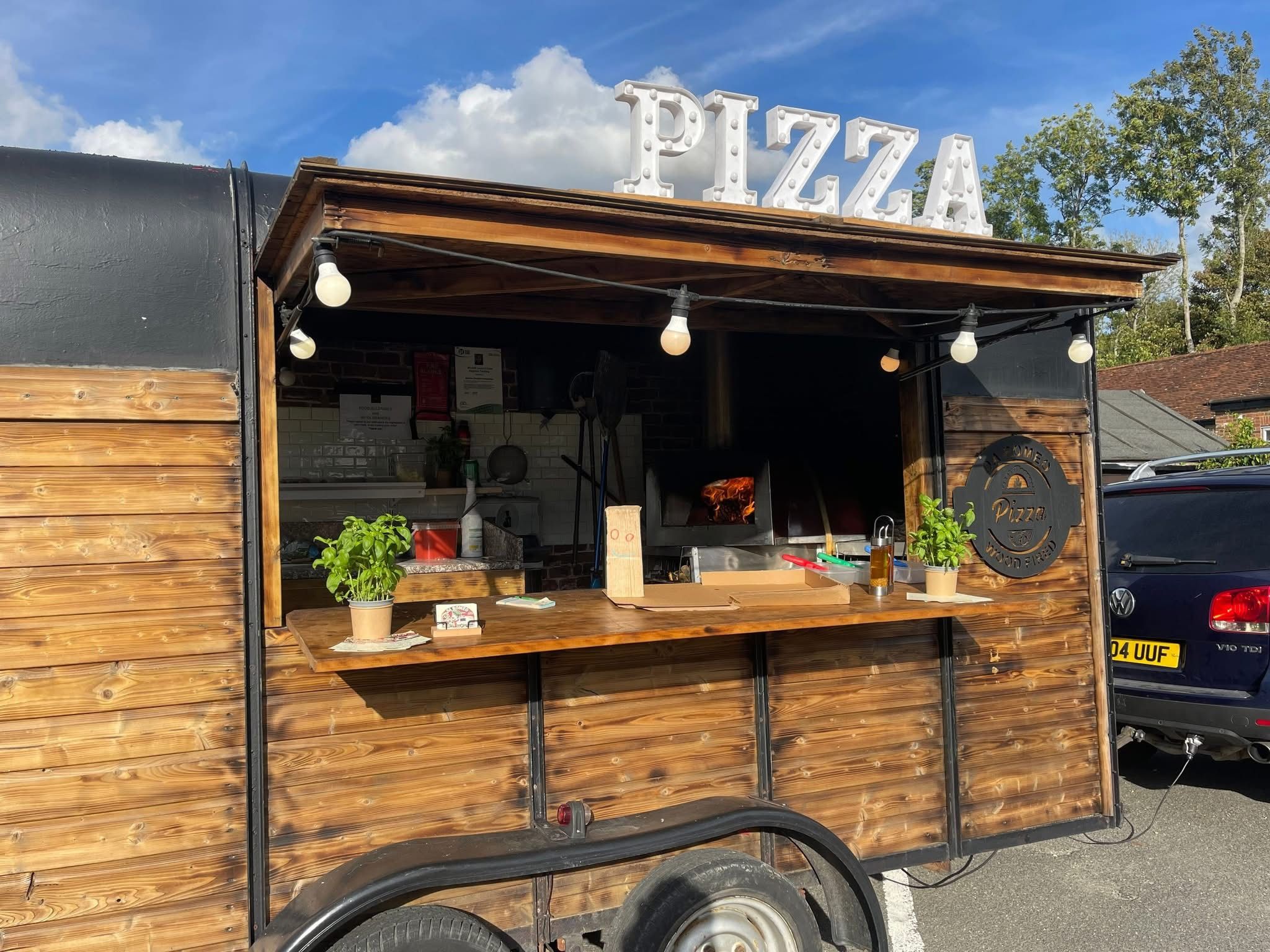 Da Romeo horse box on a sunny day with PIZZA sign