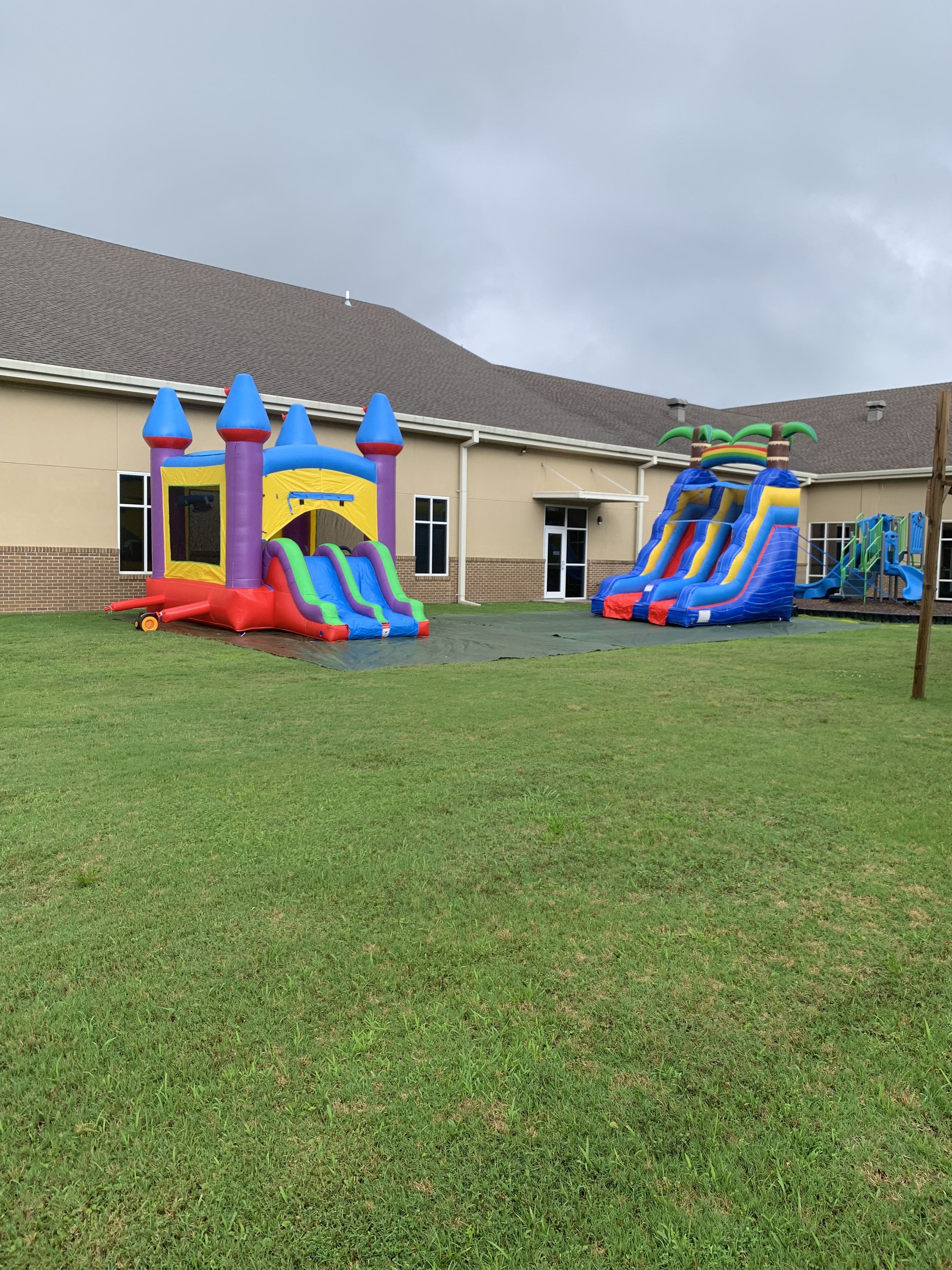 Multiple inflatables set up for a school event