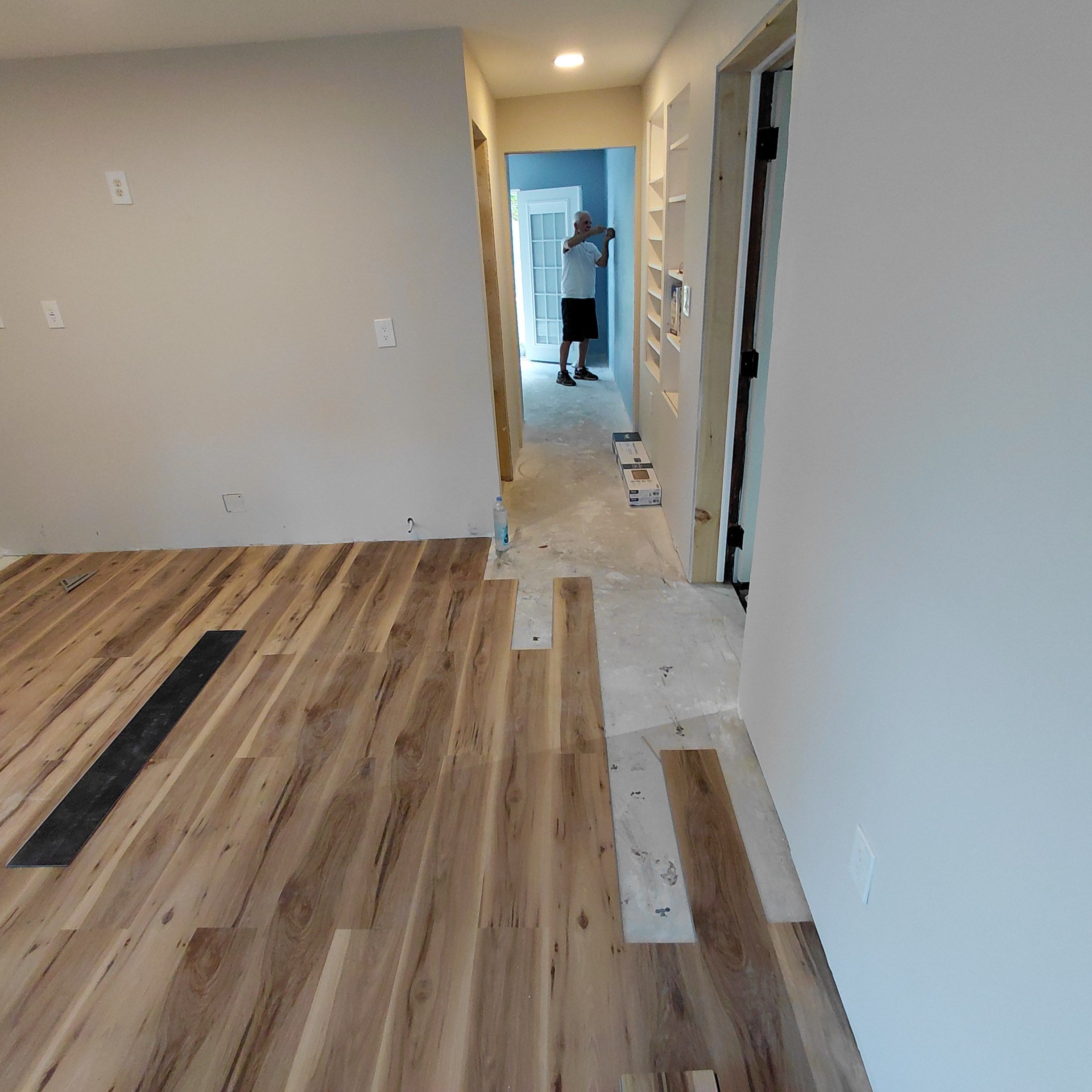 Flooring installation underway inside a home