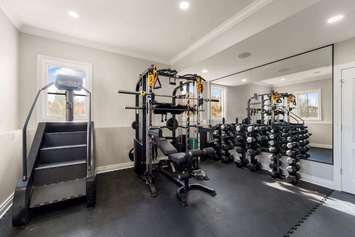 Home gym basement build completed by APX Construction Calgary