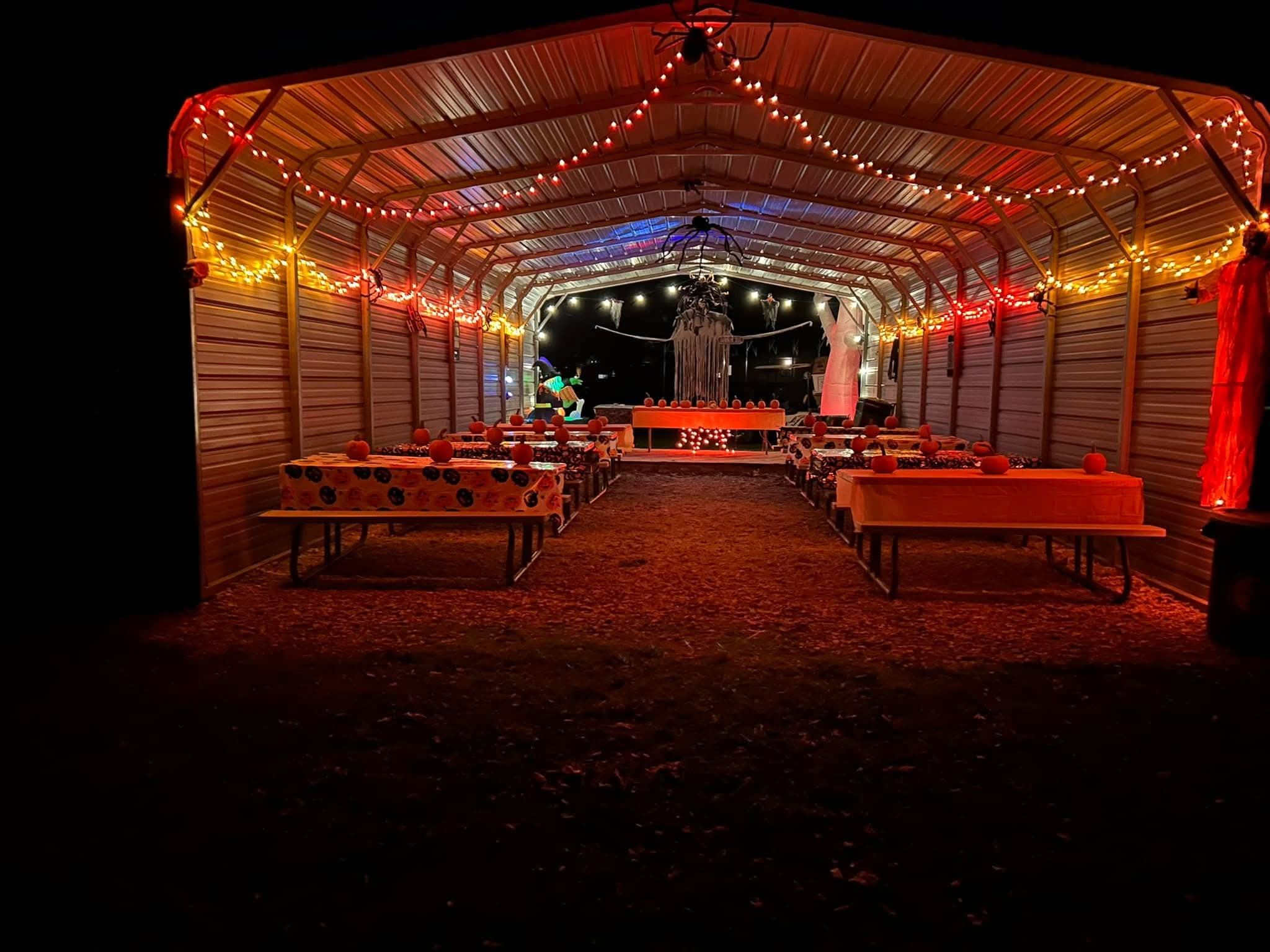 Halloween event with decorated picnic tables at Welcome Woods pavilion