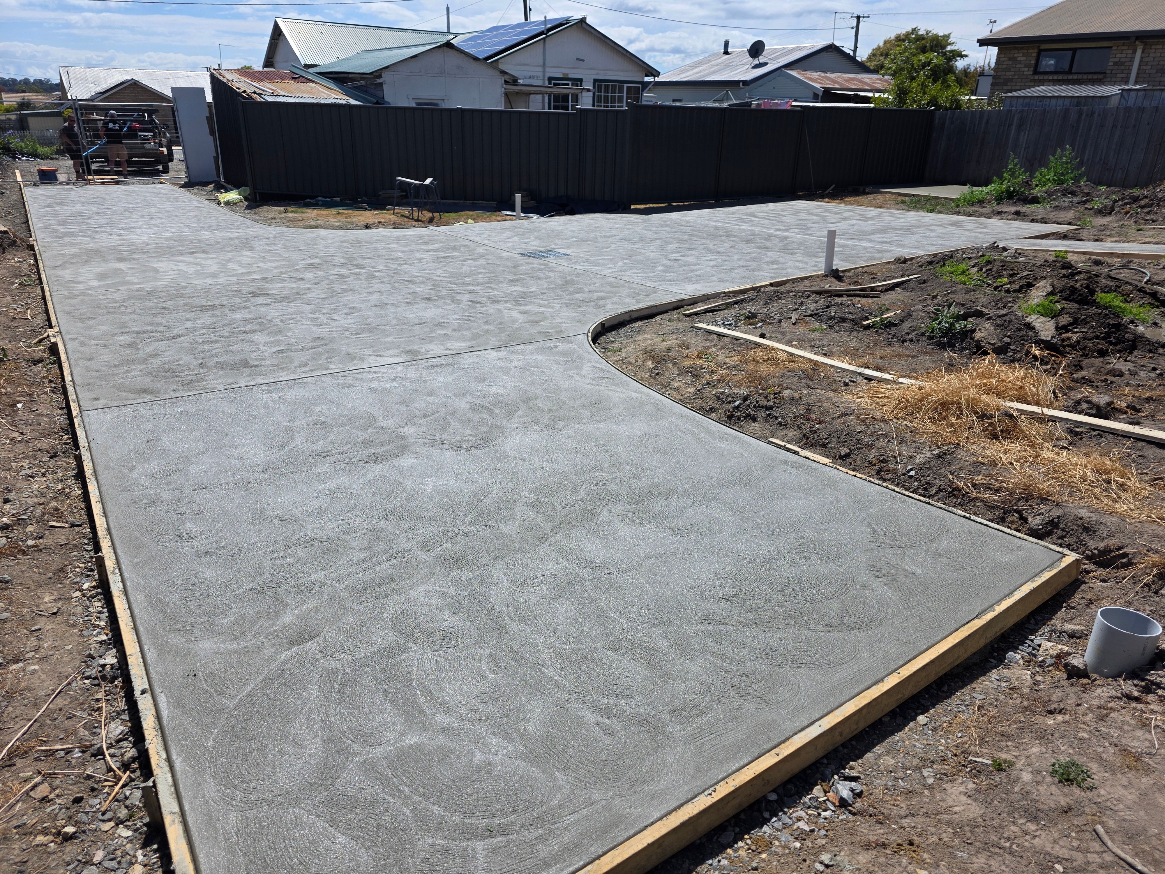 Curved driveway with textured finish