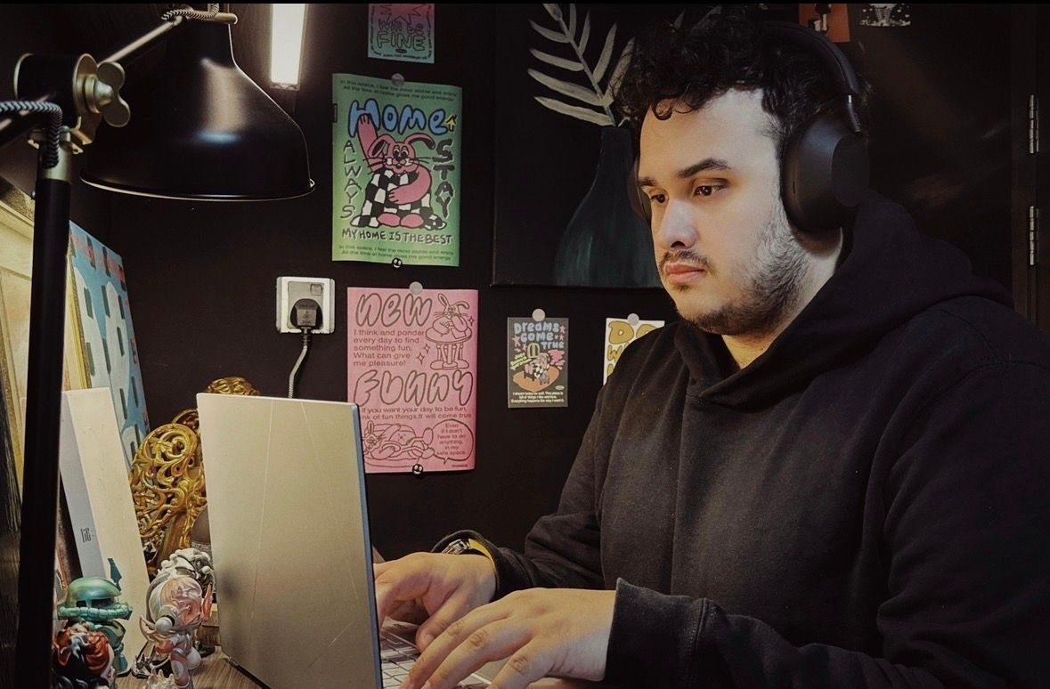 Patrick working at his desk