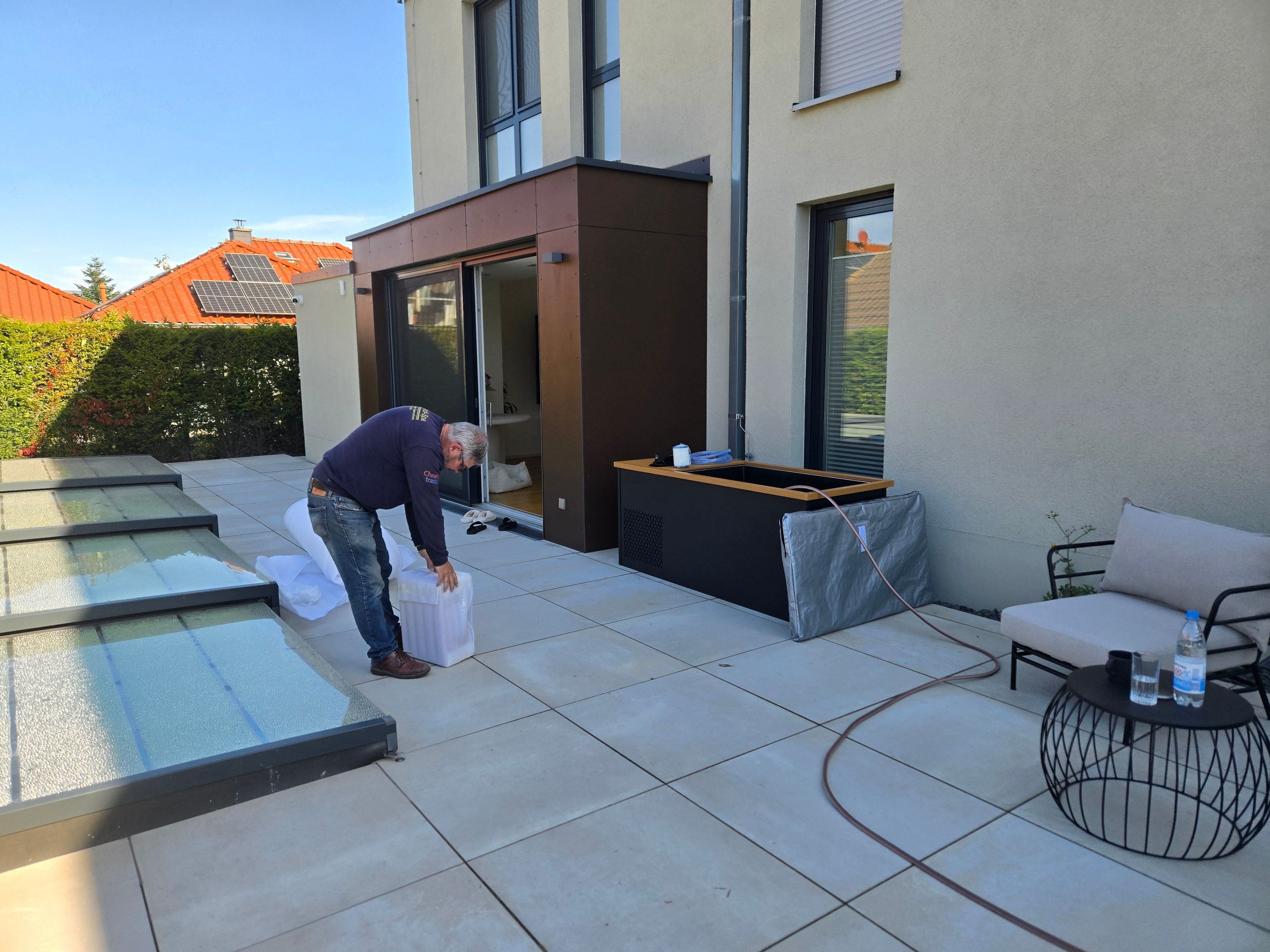 Positioning a wrapped hot tub at customer property