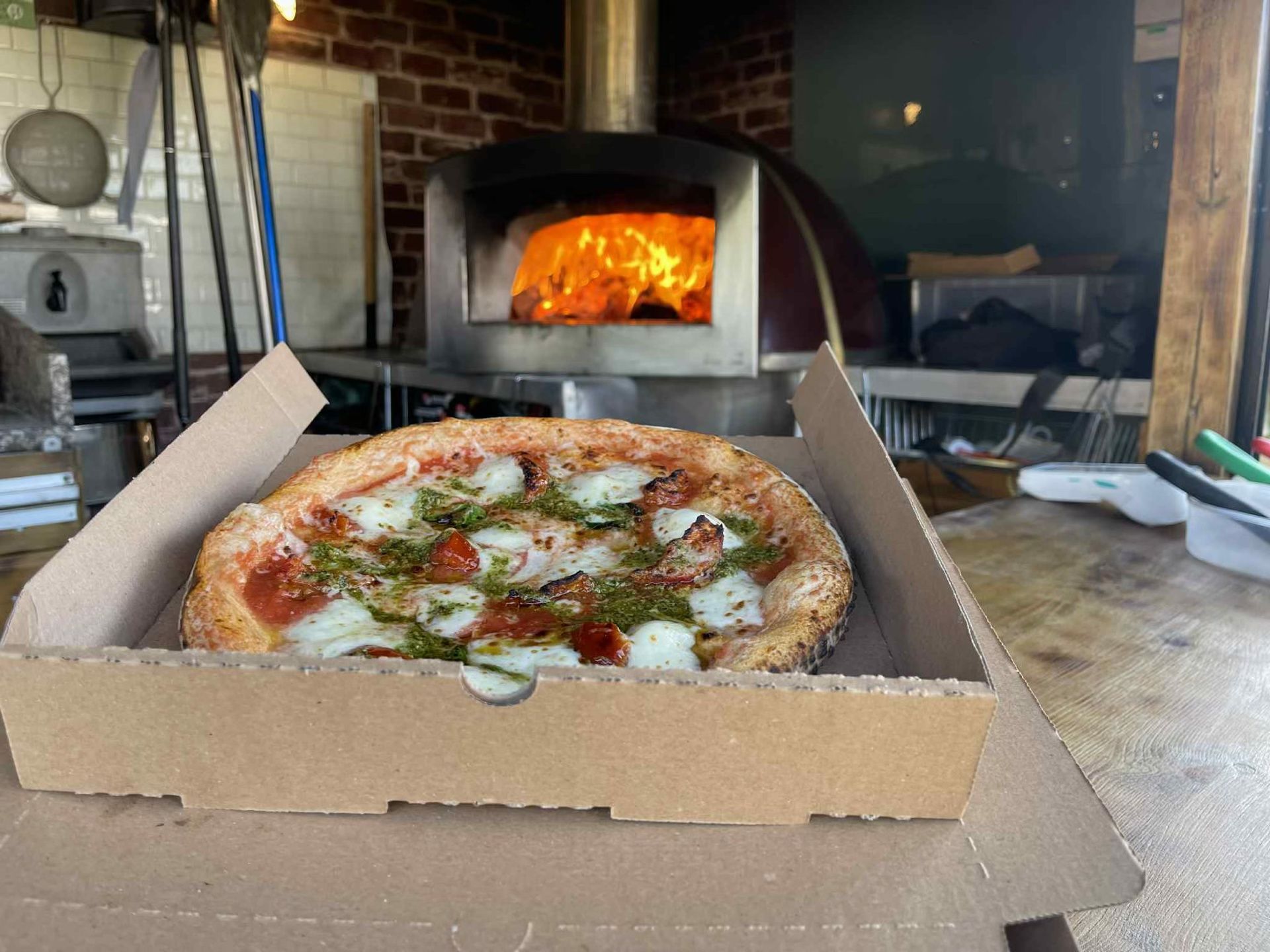 Fresh pizza with basil from the Easter event at White Hart