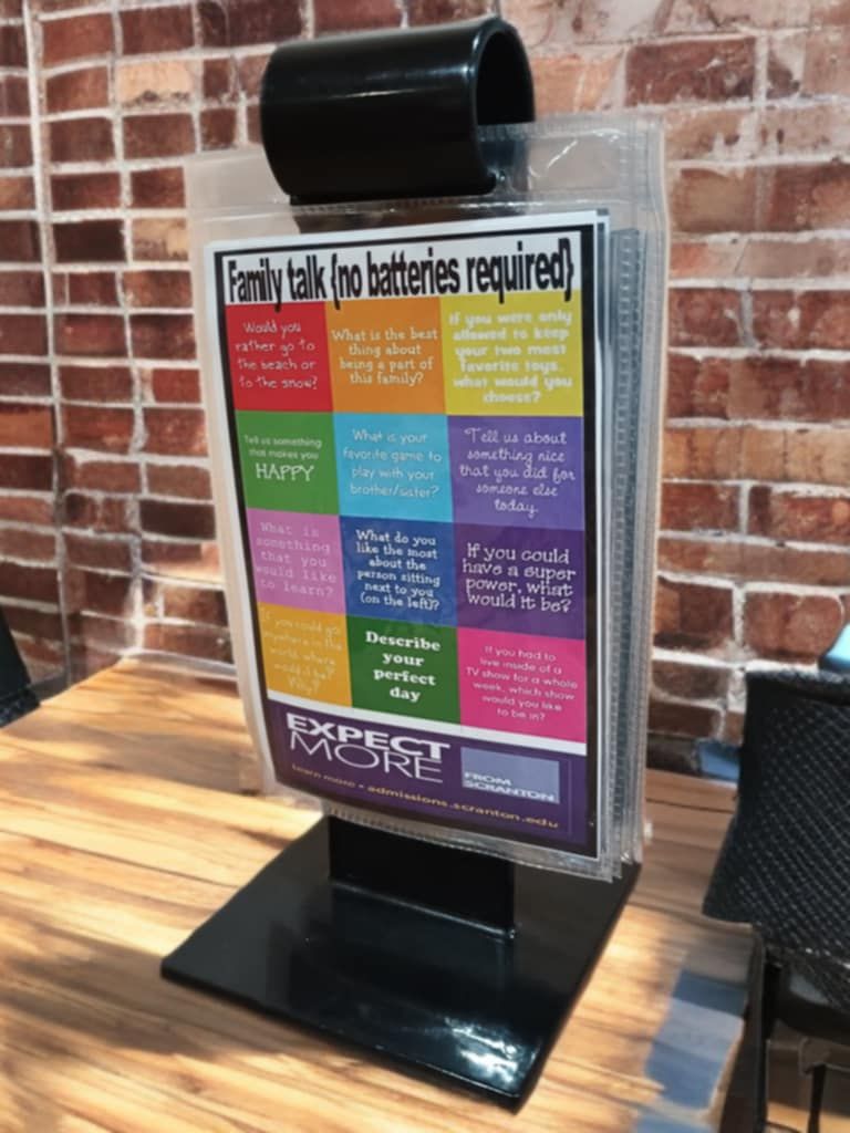 Flipping Good Marketing tabletop stand with entertainment card