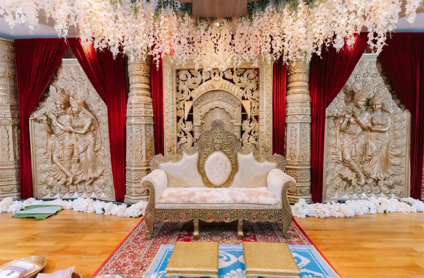 Luxury stage seating and carved backdrop