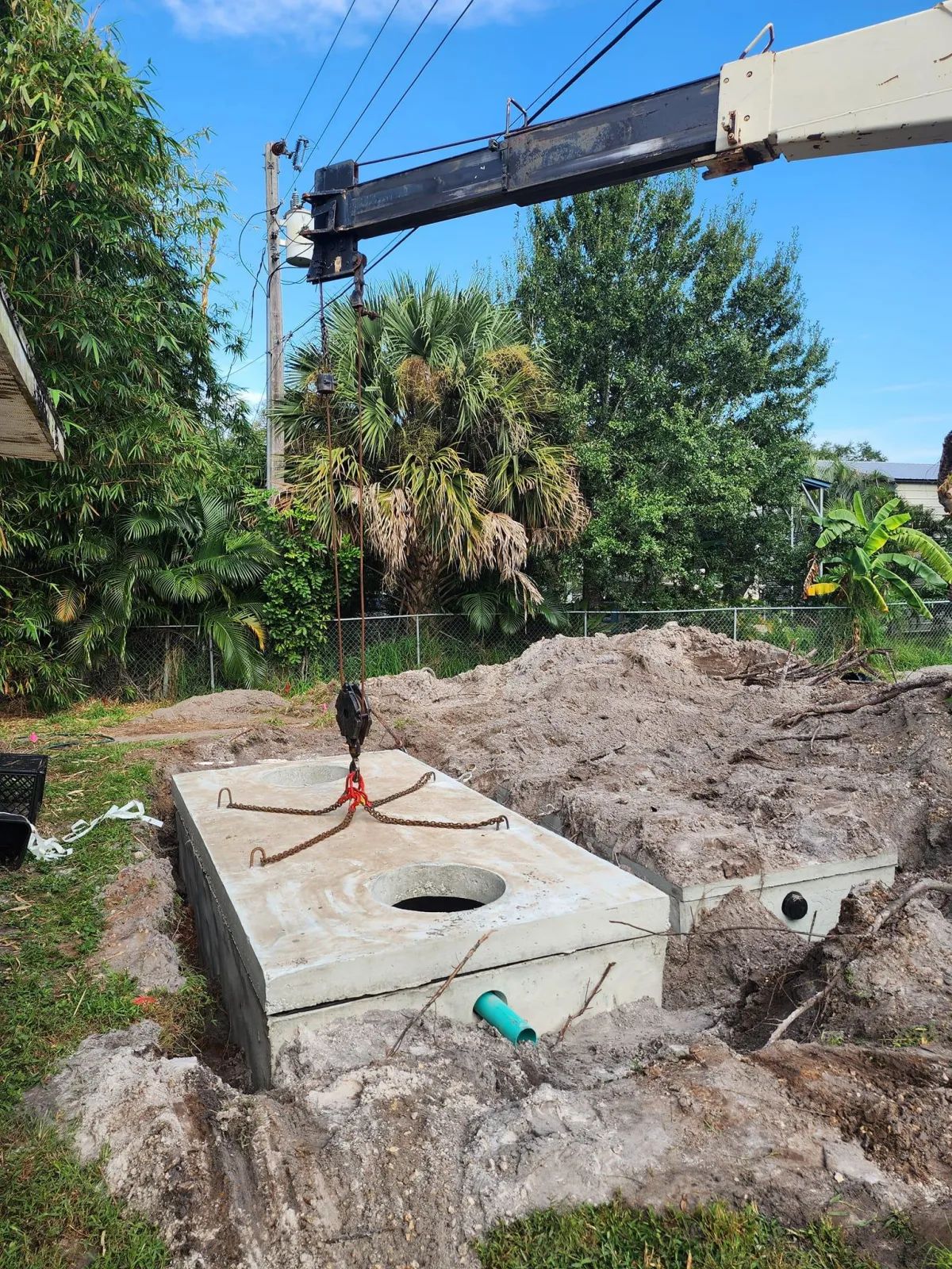 Septic tank installation with concrete chambers