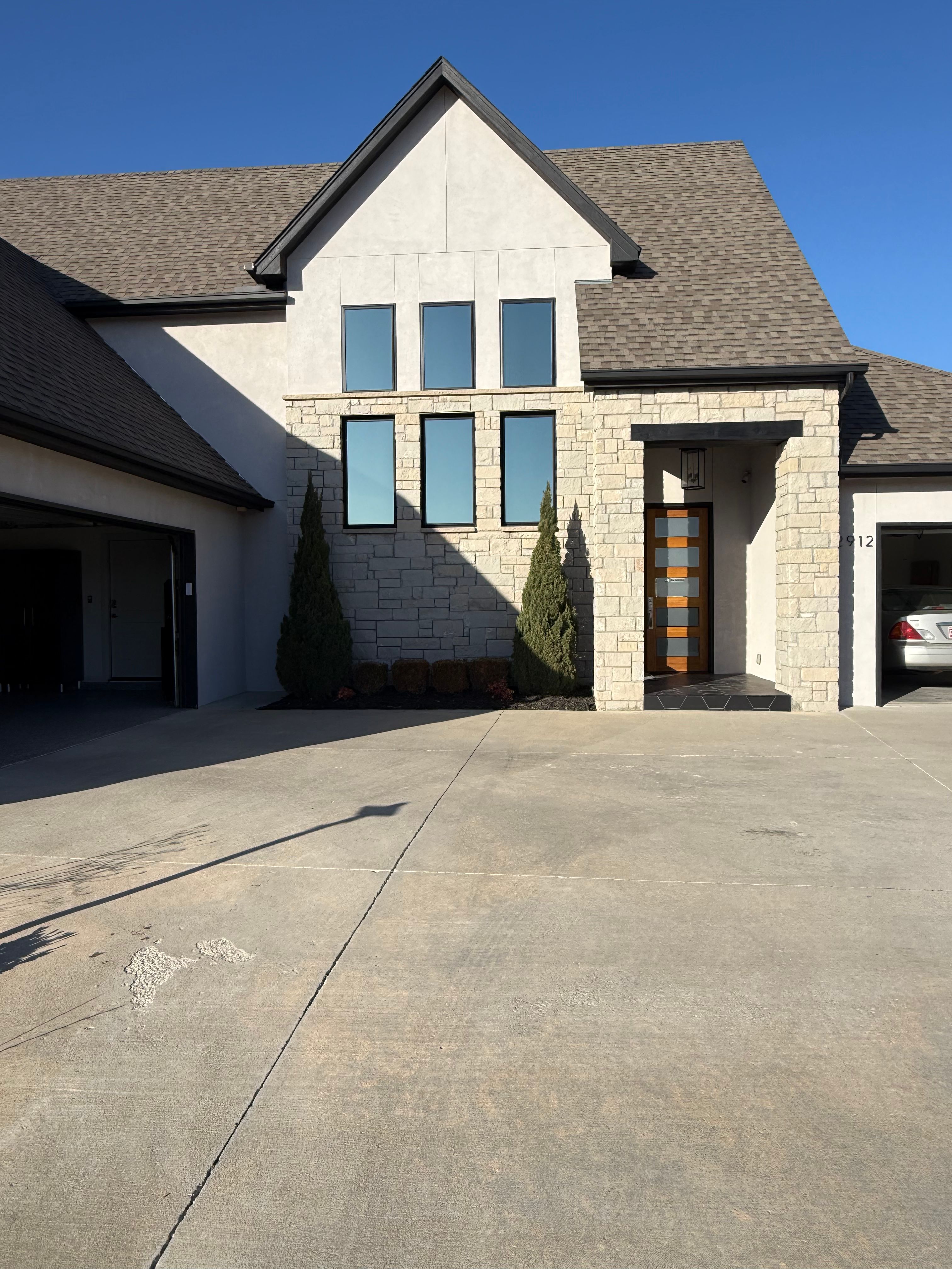 Clean home exterior with bright windows