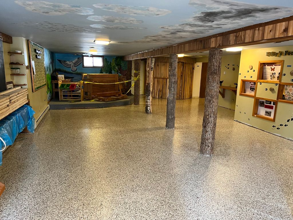 Education facility with speckled epoxy floor
