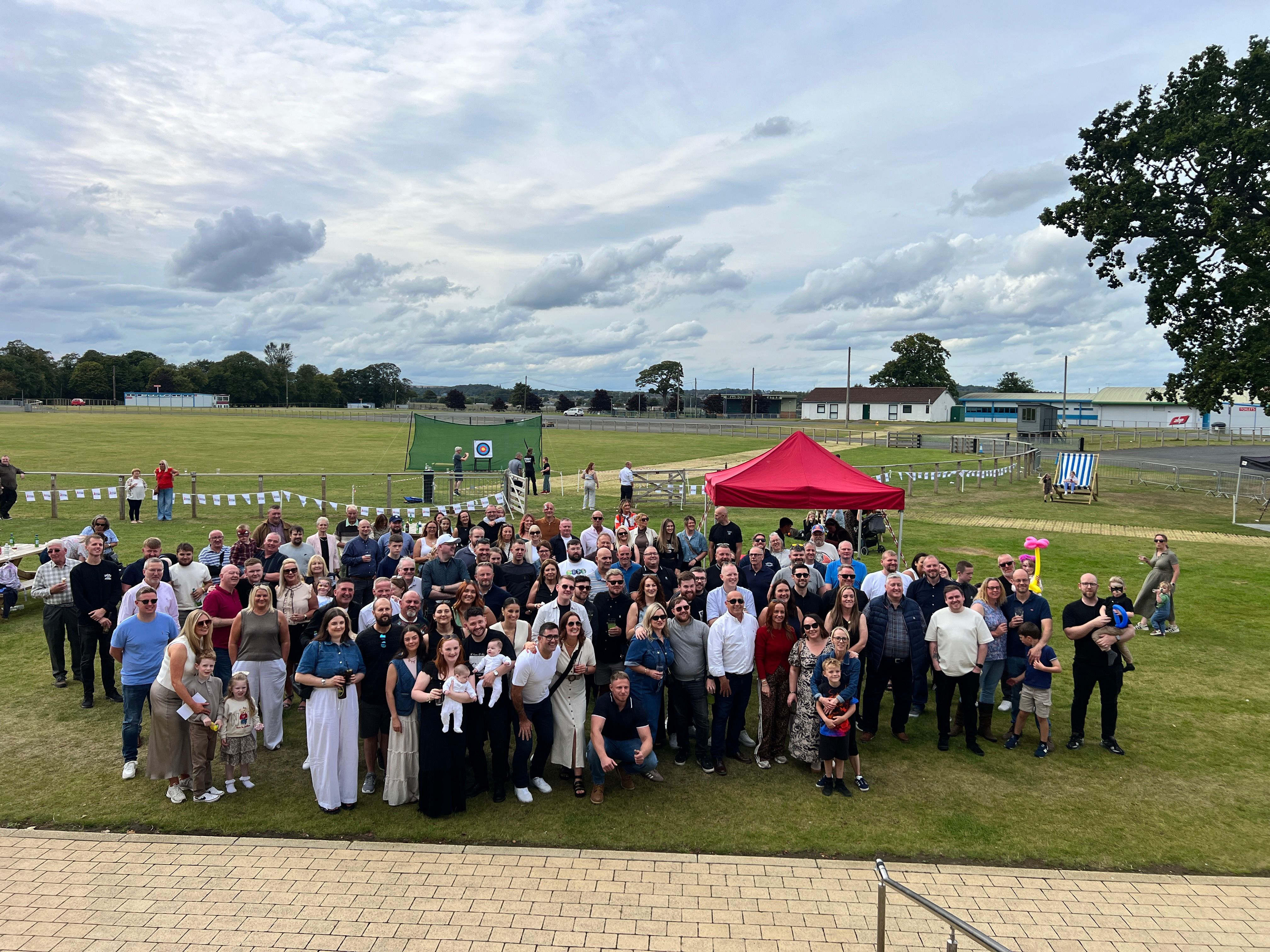 Johnston Oils corporate away day — large group outdoor event with archery and activities organised by Event Collection UK
