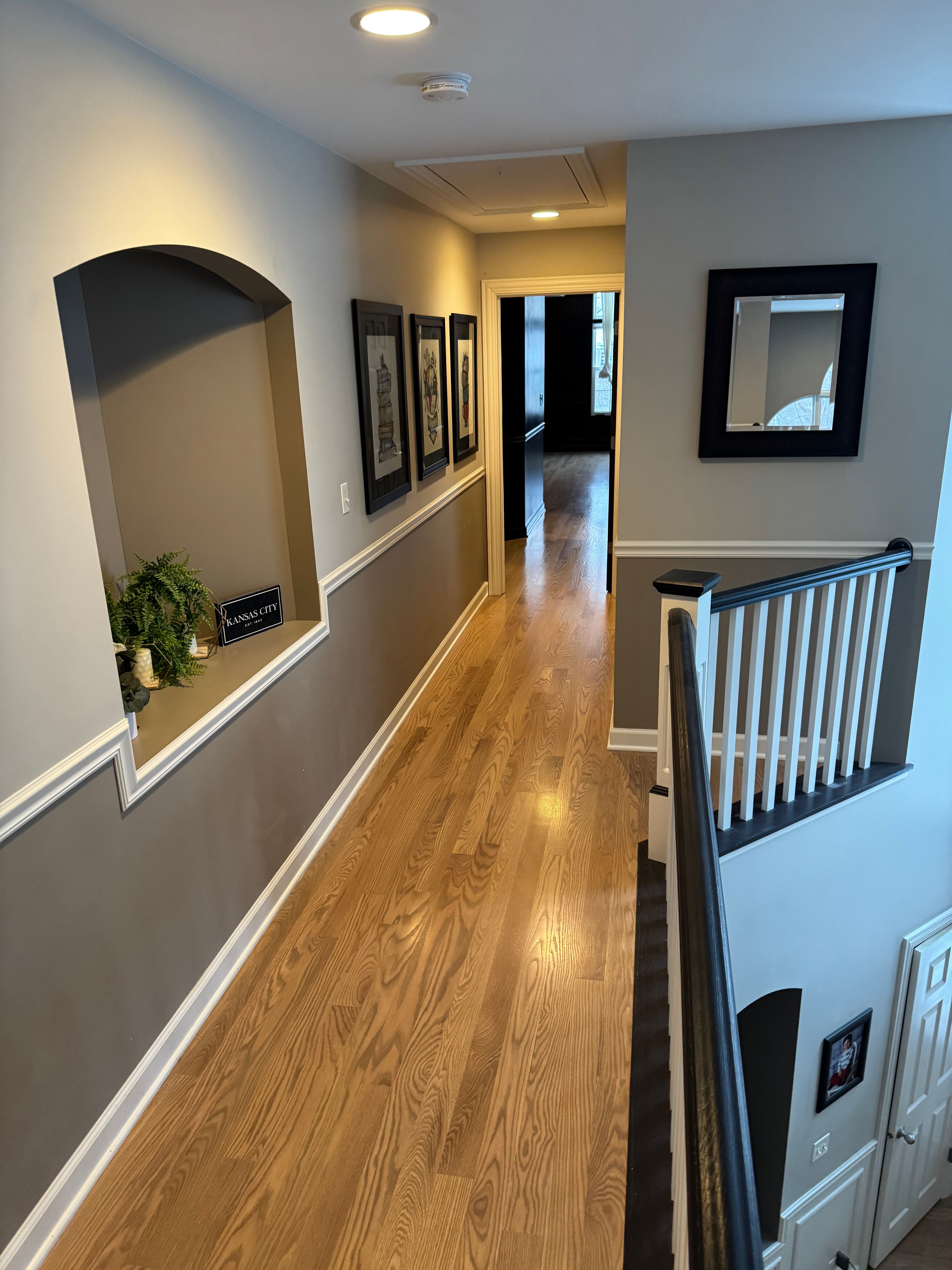 Staircase refinishing with hardwood treads in a Rockford IL home