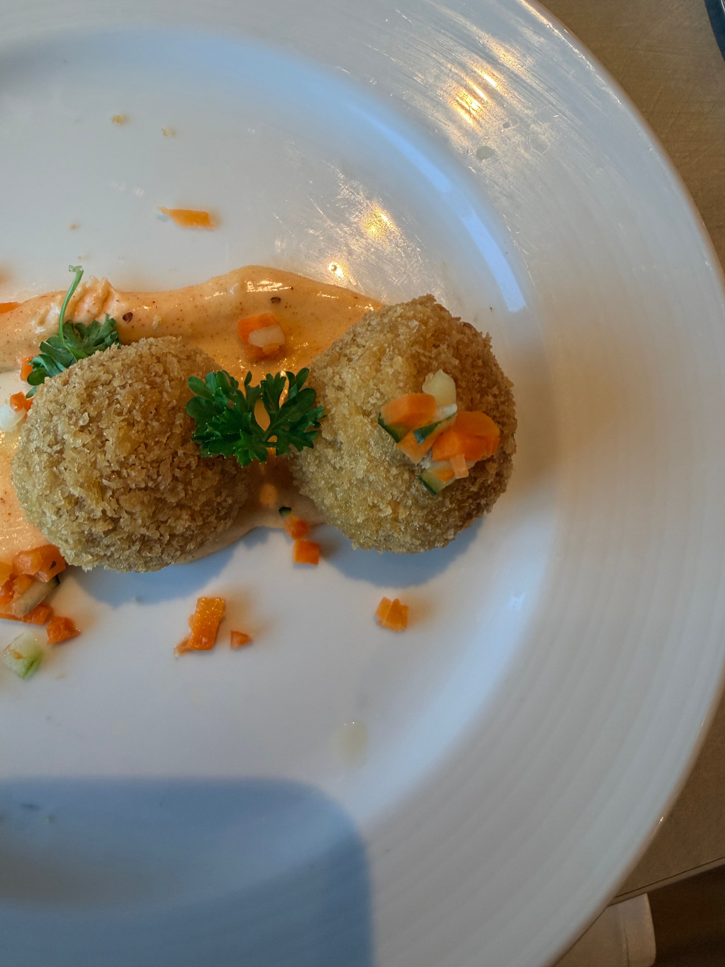 Croquettes with roasted pepper sauce