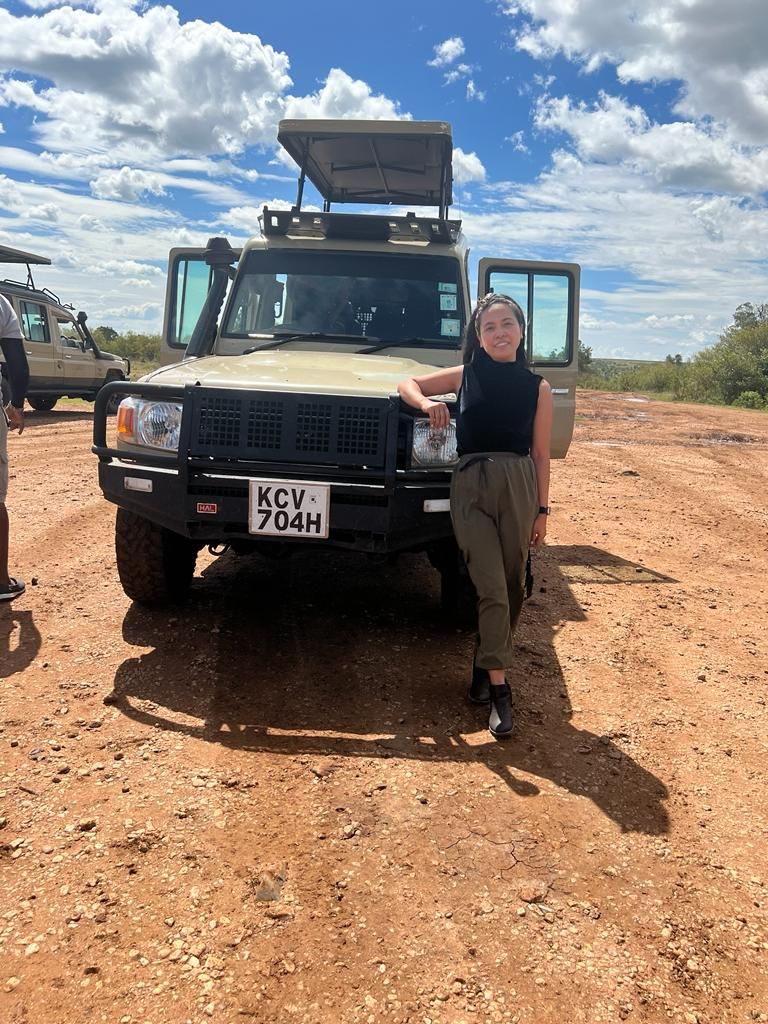Valentine with Pinkelle Safaris vehicle on safari
