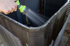 Cleaning an outdoor AC unit