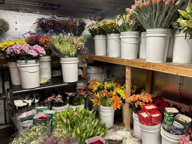 Inside our flower shop with fresh arrangements