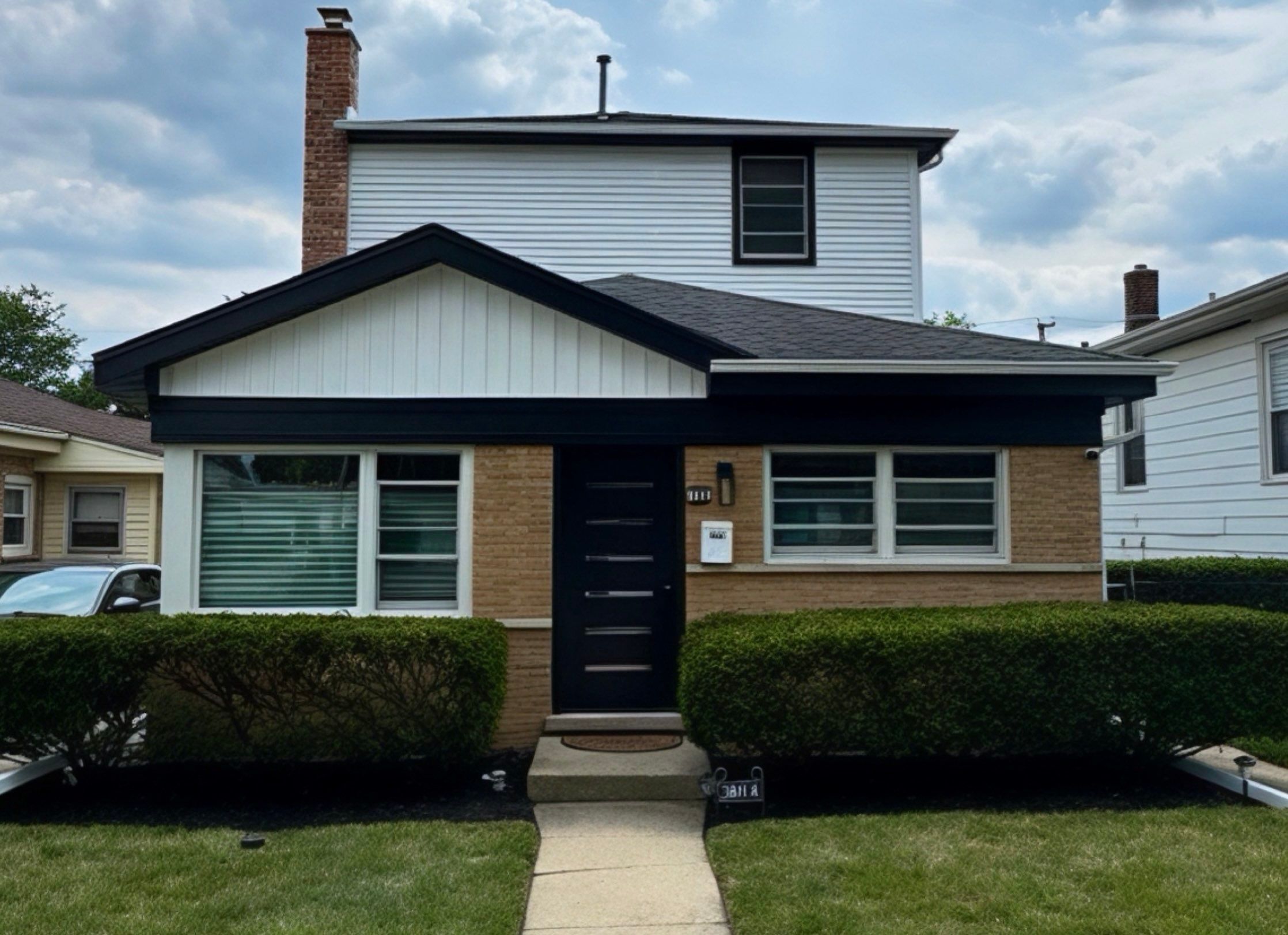 Close-up of precision gutter guard installation with ShurFlo perforated aluminum panels in Wilmette