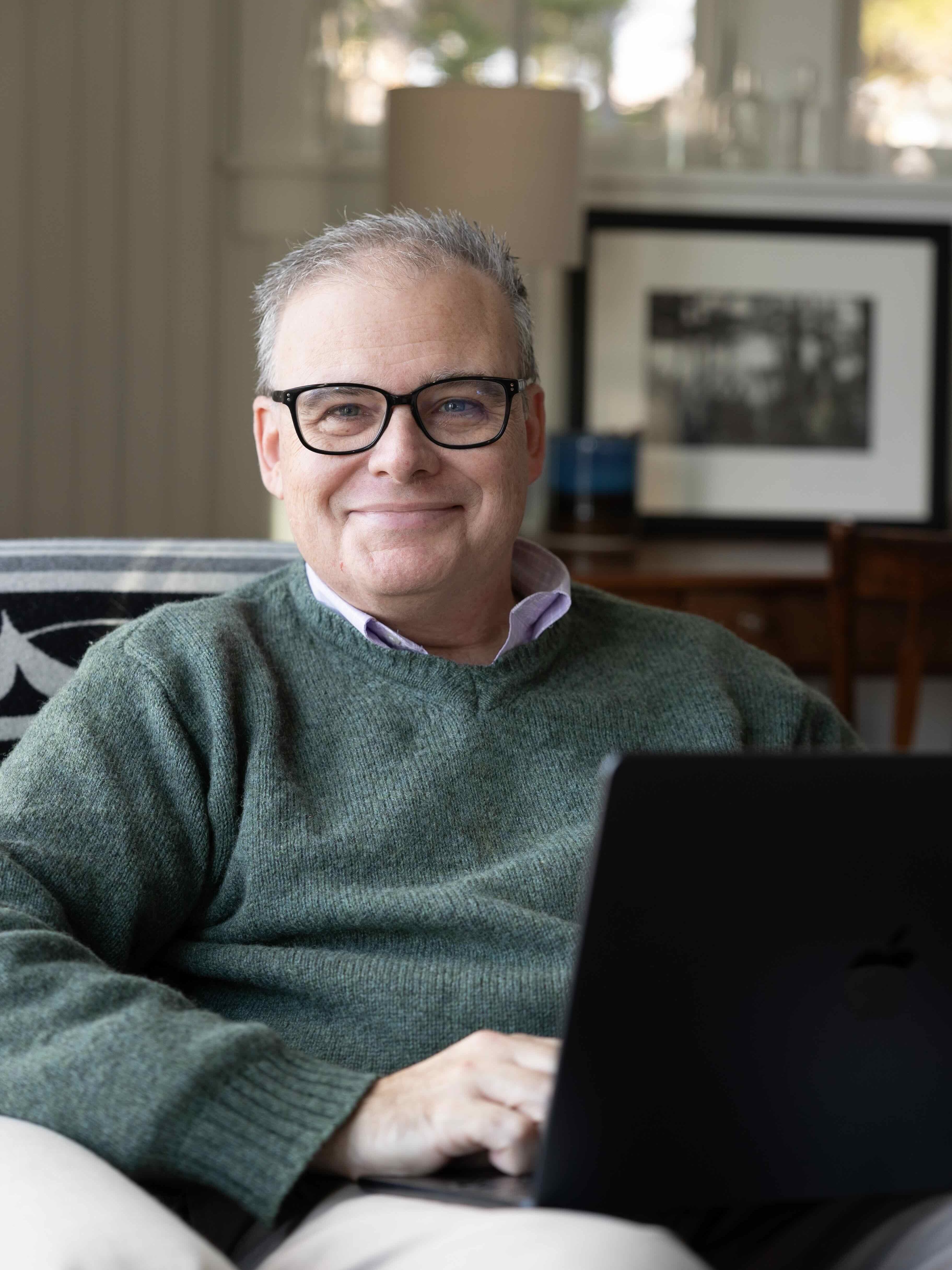 Jay Hummel helping a client with technology