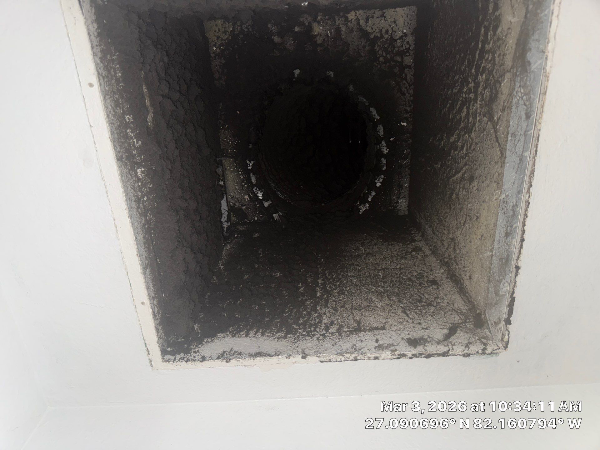 Dirty duct before professional cleaning showing dust and debris buildup