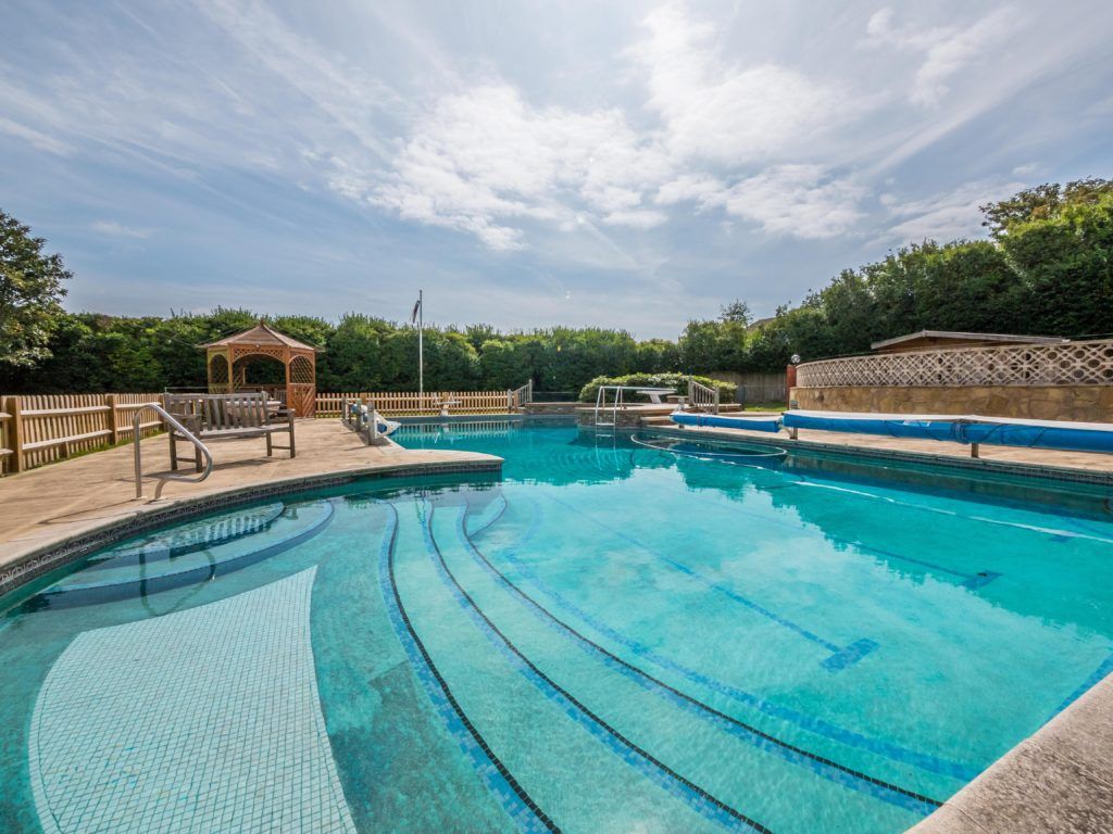 Outdoor swimming pool at a property in East Sussex