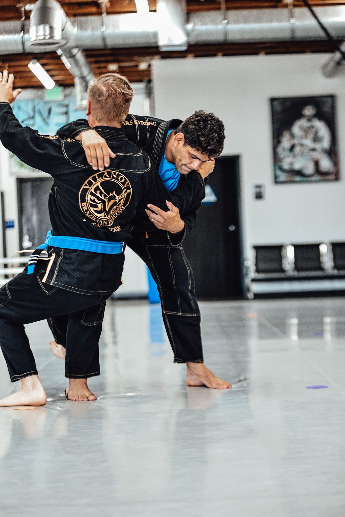 Professor Beto and Coach Mike demonstrating Osoto Gari in BJJ gis