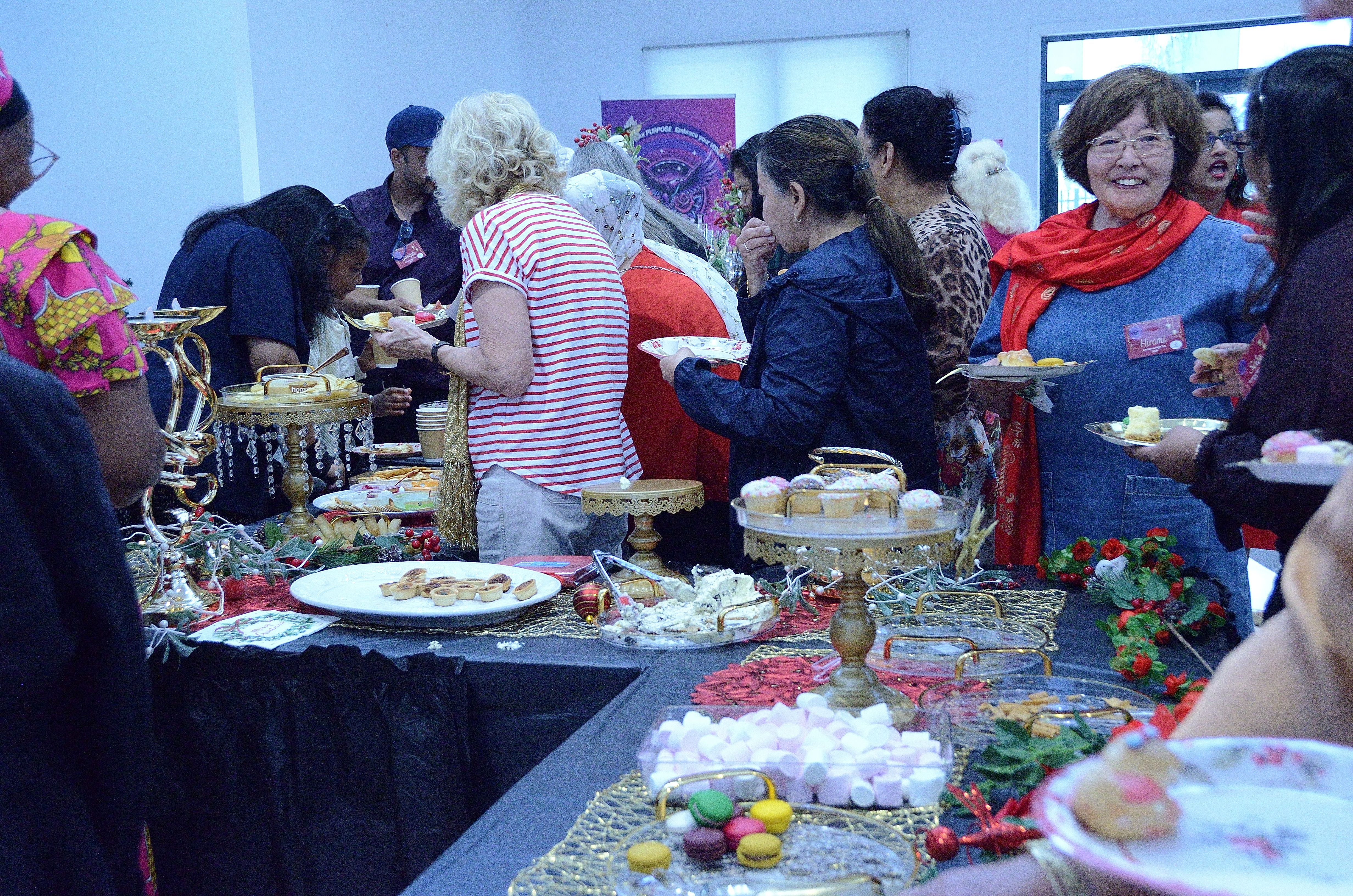 Women networking and enjoying food at an E-Girl Empowerment gathering in Melbourne