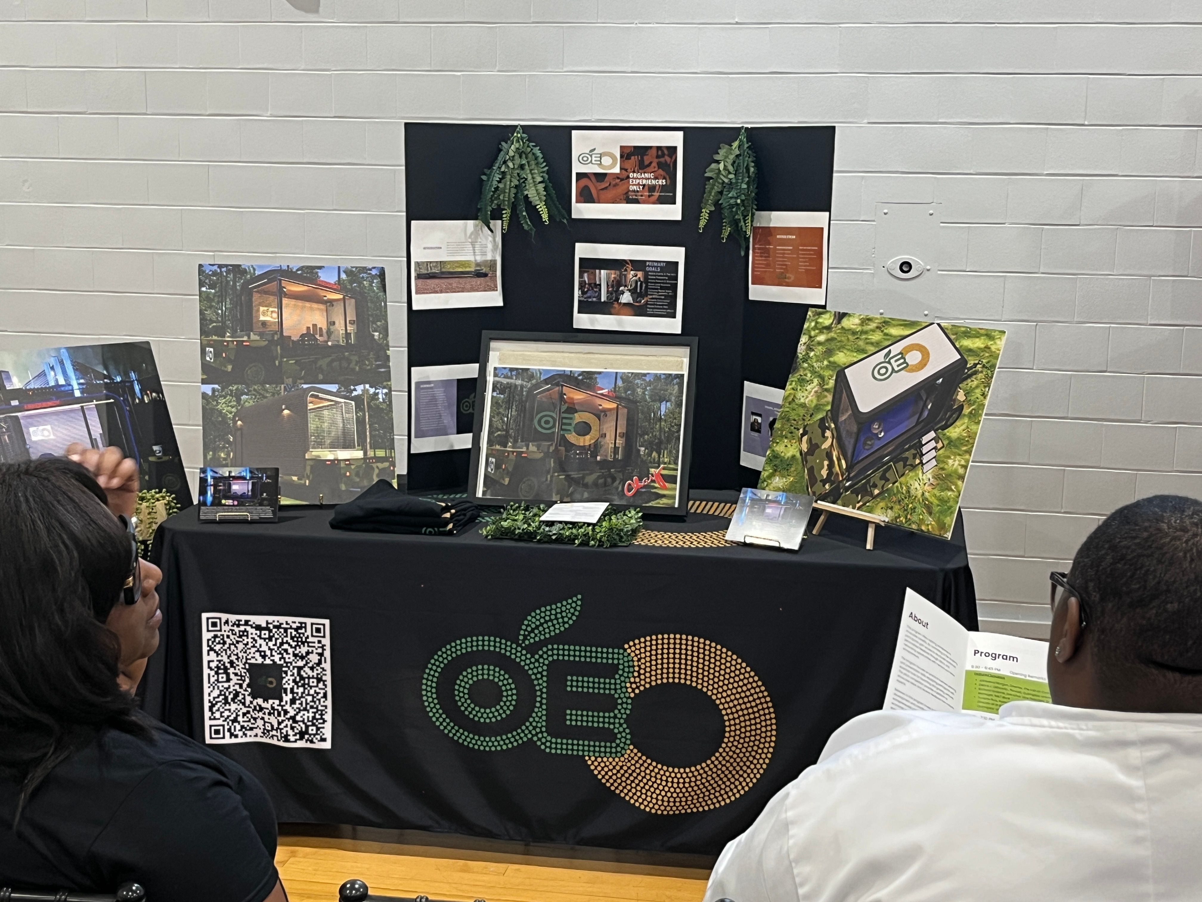 PrintzOnDeck booth at community event showcasing values in action